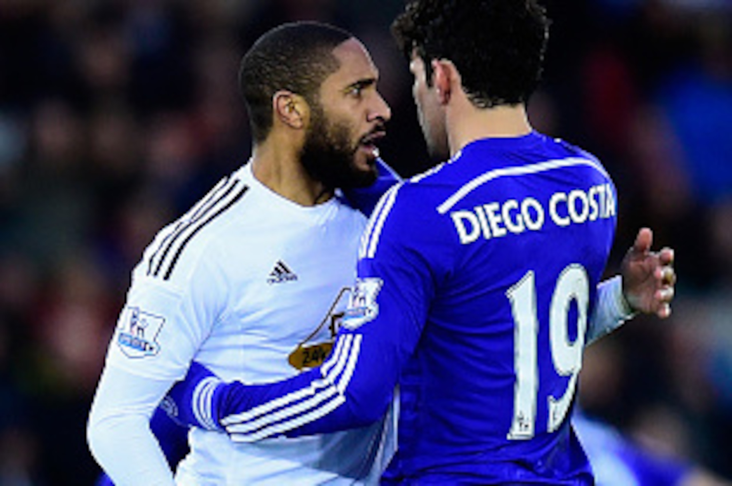 SWANSEA, WALES - JANUARY 17:  Chelsea player Diego Costa and Ashley Williams of Swansea clash during the Barclays Premier League match between Swansea City and Chelsea at Liberty Stadium on January 17, 2015 in Swansea, Wales.  (Photo by Stu Forster/Getty 