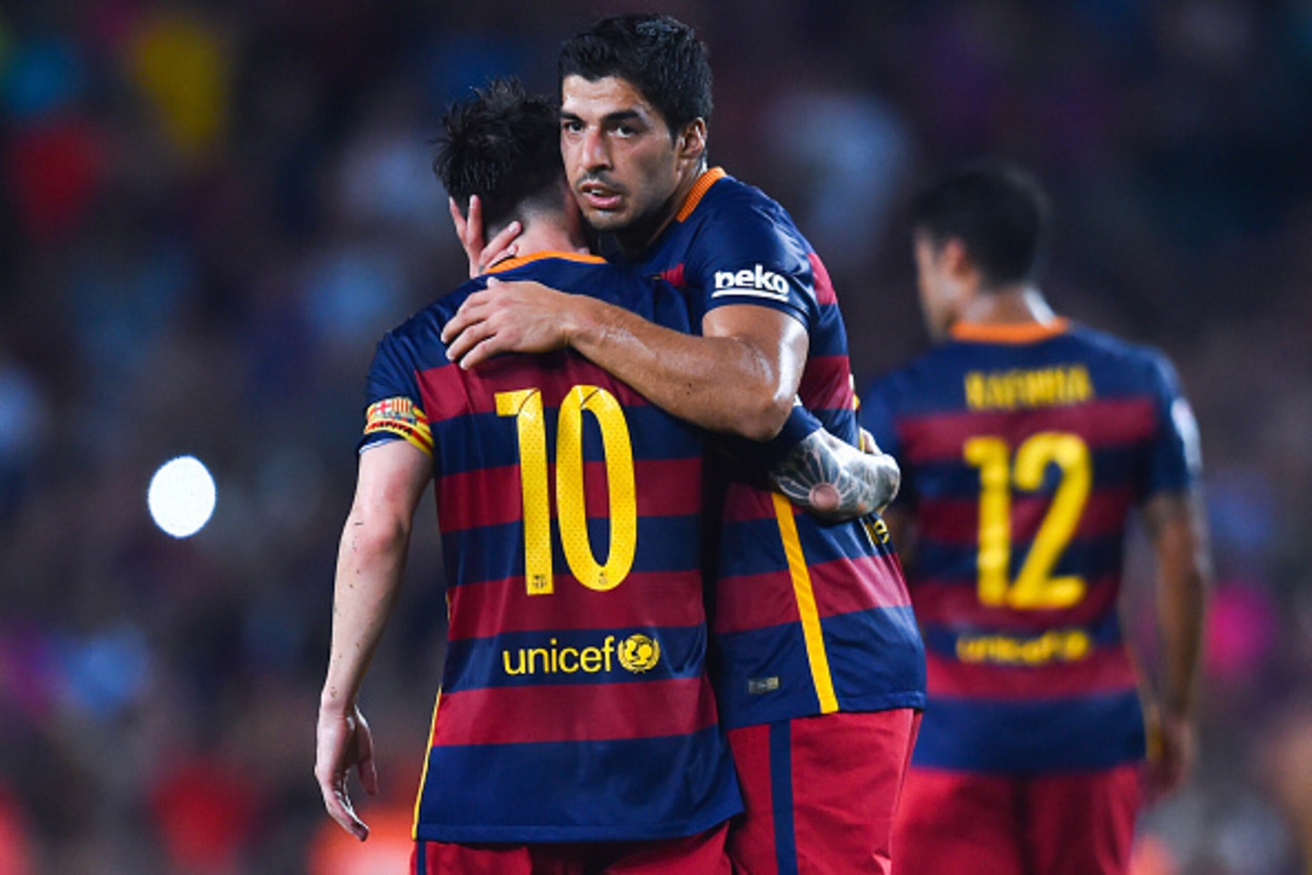 BARCELONA, SPAIN - AUGUST 05:  Lionel Messi (L) of FC Barcelona celebrates with his teammate Luis Suarez of FC Barcelona after scoring his team's second goal during the Joan Gamper trophy match at Camp Nou on August 5, 2015 in Barcelona, Spain.  (Photo by