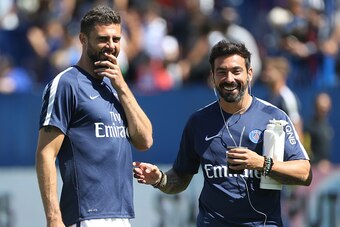MONTREAL, QC  - AUGUST 1: Thiago Motta of PSG and Ezequiel Lavezzi of PSG laugh before the 2015 Trophee des Champions between Paris Saint-Germain (PSG) and Olympique Lyonnais (OL) at Stade Saputo on August 1, 2015 in Montreal, Quebec, Canada. (Photo by Je