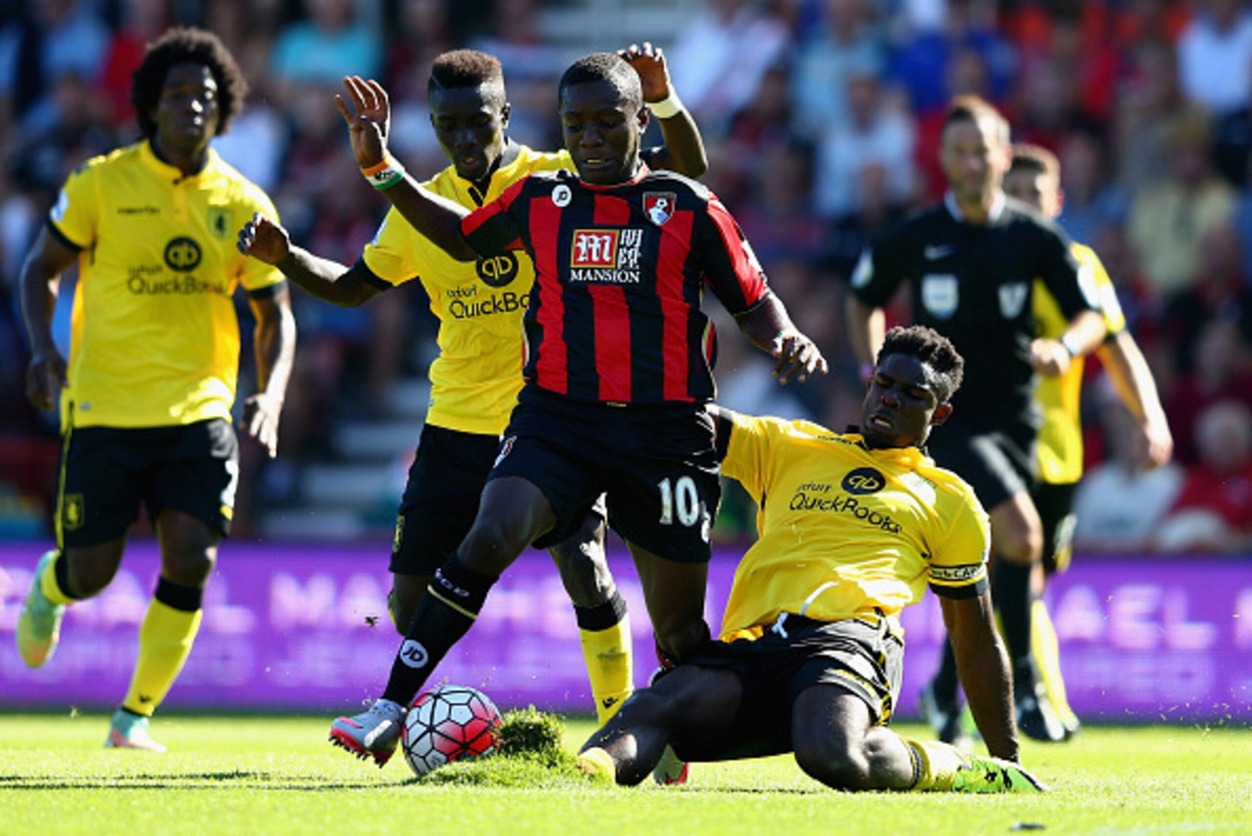 BOURNEMOUTH, ENGLAND - AUGUST 08:  Max Gradel of Bournemouth and Micah Richards of Aston Villa compete for the ball during the Barclays Premier League match between A.F.C. Bournemouth and Aston Villa at Vitality Stadium on August 8, 2015 in Bournemouth, E