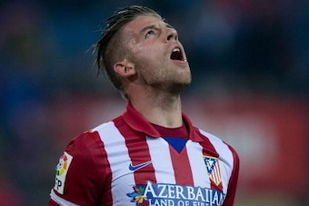 MADRID, SPAIN - DECEMBER 18: Toby Alderweireld of Atletico de Madrid celebrates scoring their second goal during the Copa del Rey Round of 32 second leg match between Club Atletico de Madrid and Sant Andreu at Vivente Calderon Stadium on December 18, 2013