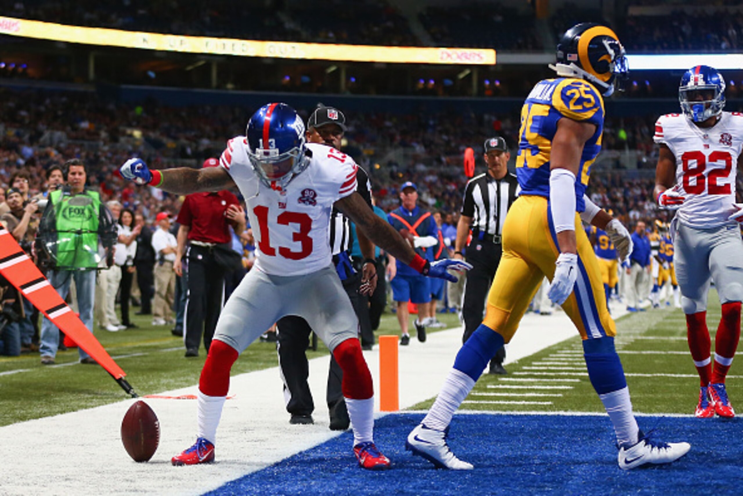 ST. LOUIS, MO - DECEMBER 21: Odell Beckham Jr. #13 of the New York Giants celebrates after scoring a touchdown against the St. Louis Rams during the first quarter at the Edward Jones Dome on December 21, 2014 in St. Louis, Missouri.  (Photo by Dilip Vishw