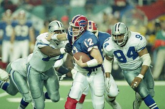 Opponents had a hard time keeping the 6'5", 252-pound Charles Haley (No. 94) out of the backfield.