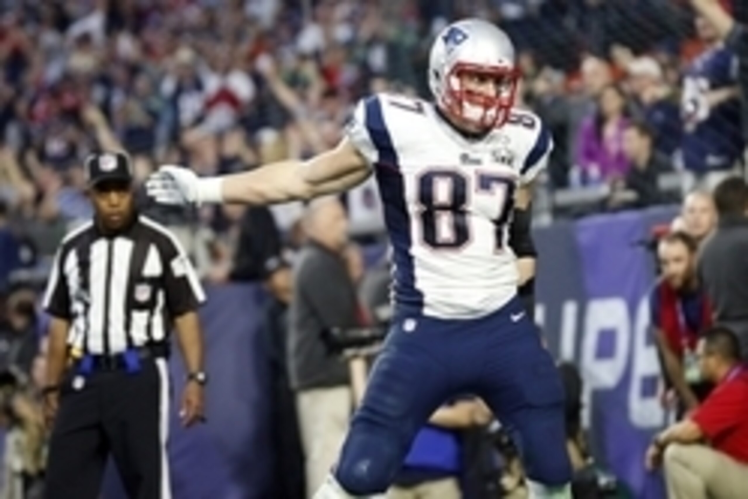 Feb 1, 2015; Glendale, AZ, USA; New England Patriots tight end Rob Gronkowski (87) celebrates after a touchdown against the New England Patriots during the second quarter in Super Bowl XLIX at University of Phoenix Stadium. Mandatory Credit: Matthew Emmon