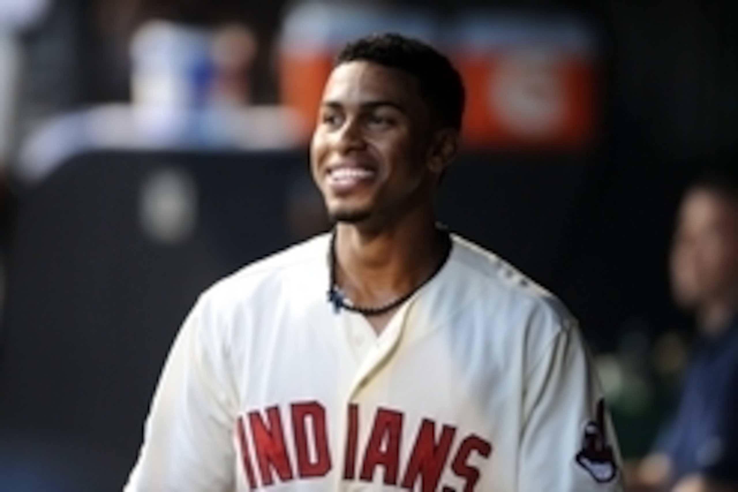 Aug 8, 2015; Cleveland, OH, USA; Cleveland Indians shortstop Francisco Lindor (12) in the dugout after hitting a sacrifice fly during the third inning against the Minnesota Twins at Progressive Field. Mandatory Credit: Ken Blaze-USA TODAY Sports