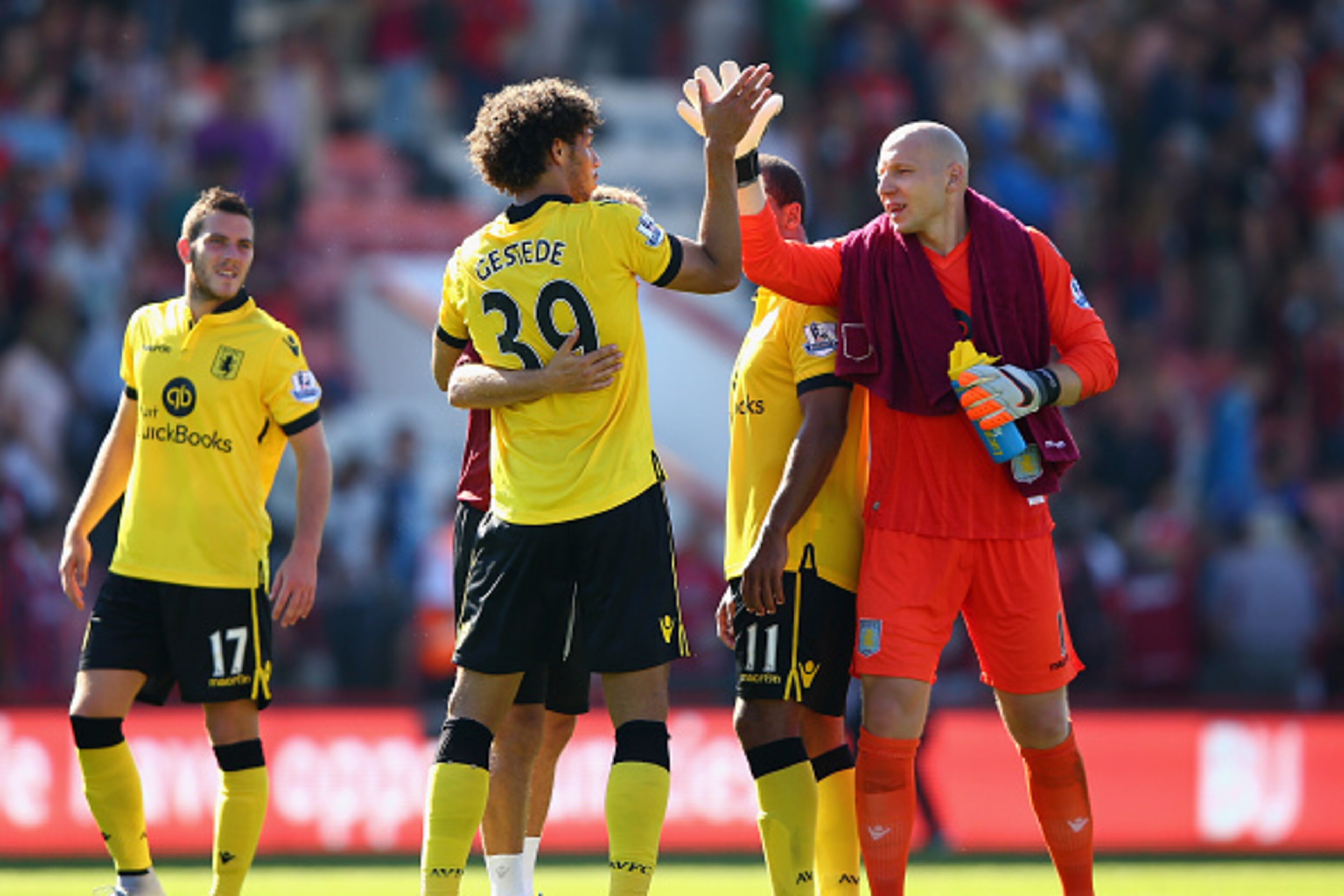 BOURNEMOUTH, ENGLAND - AUGUST 08: Rudy Gestede (2nd L) of Aston Villa celebrates his team's 1-0 win with his team mate Brad Guzan (R) in the Barclays Premier League match between A.F.C. Bournemouth and Aston Villa at Vitality Stadium on August 8, 2015 in BOURNEMOUTH, ENGLAND - AUGUST 08: Rudy Gestede (2nd L) of Aston Villa celebrates his team's 1-0 win with his team mate Brad Guzan (R) in the Barclays Premier League match between A.F.C. Bournemouth and Aston Villa at Vitality Stadium on August 8, 2015 in