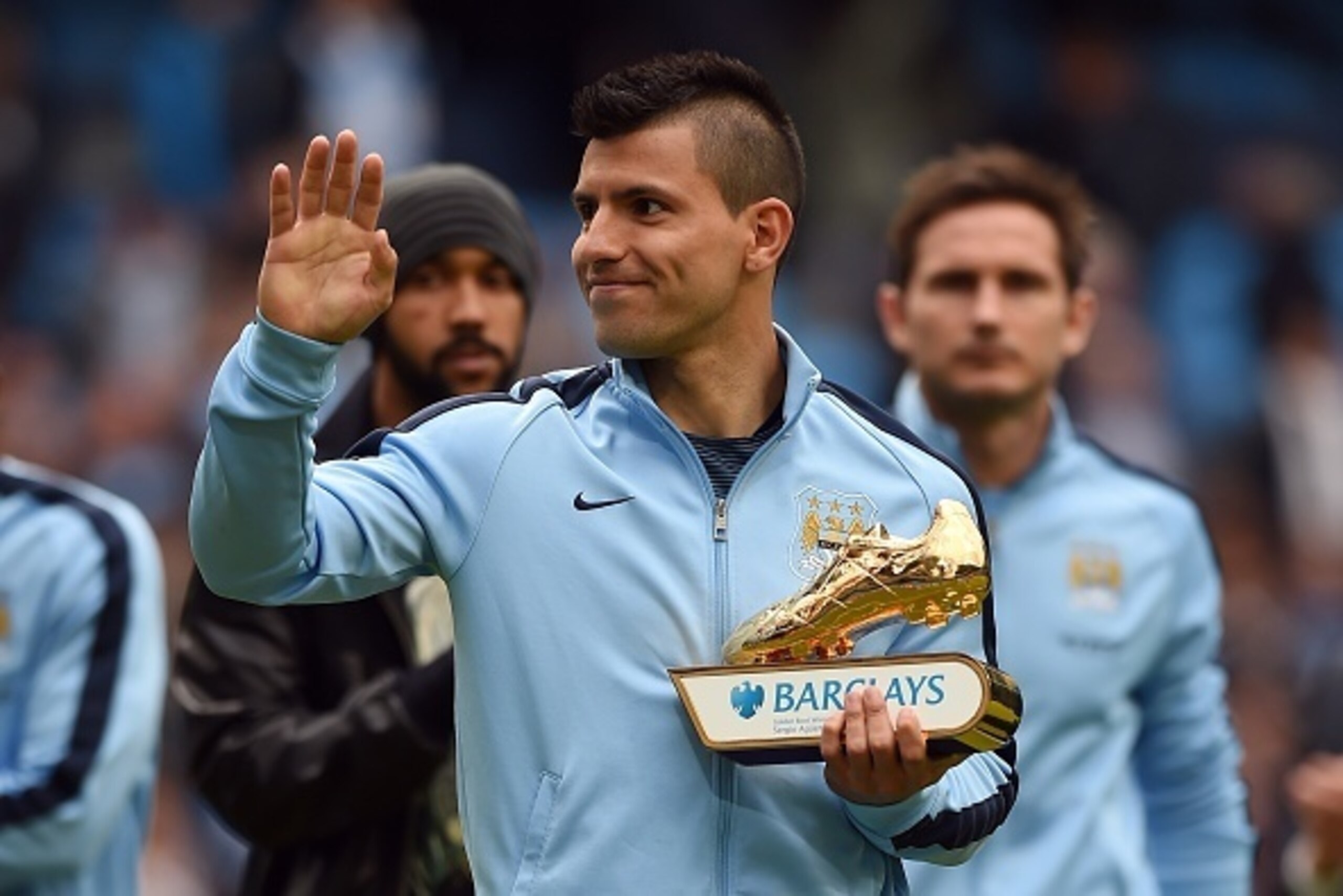 Manchester City's Argentinian striker Sergio Aguero gestures holding the Premier League Golden Boot for being the top goalscorer in the league after the English Premier League football match between Manchester City and Southampton at the Etihad Stadium in