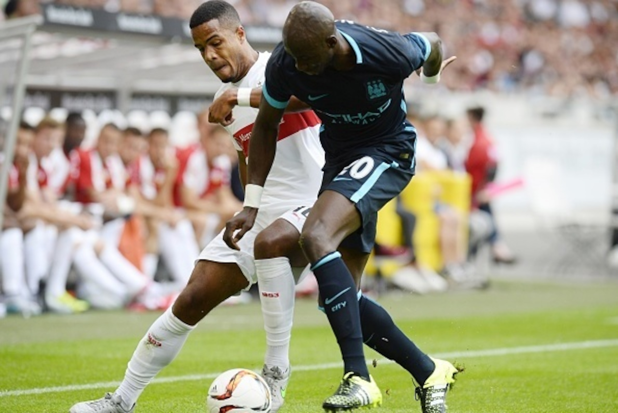 Stuttgart's midfielder Daniel Didavi (L) and Manchester's French defender Eliaquim Mangala vie for the ball during the friendly football match between VfB Stuttgart and Manchester City in Stuttgart, southern Germany, on August 1, 2015. AFP PHOTO / THOMAS Stuttgart's midfielder Daniel Didavi (L) and Manchester's French defender Eliaquim Mangala vie for the ball during the friendly football match between VfB Stuttgart and Manchester City in Stuttgart, southern Germany, on August 1, 2015. AFP PHOTO / THOMAS