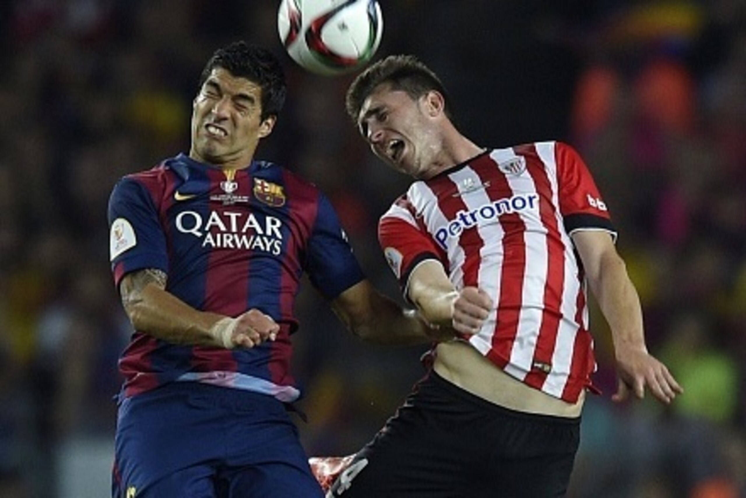 Barcelona's Uruguayan forward Luis Suarez (L) vies with Athletic Bilbao's French defender Aymeric Laporte (R) during the Spanish Copa del Rey (King's Cup) final football match Athletic Club Bilbao vs FC Barcelona at the Camp Nou stadium in Barcelona on Ma Barcelona's Uruguayan forward Luis Suarez (L) vies with Athletic Bilbao's French defender Aymeric Laporte (R) during the Spanish Copa del Rey (King's Cup) final football match Athletic Club Bilbao vs FC Barcelona at the Camp Nou stadium in Barcelona on Ma