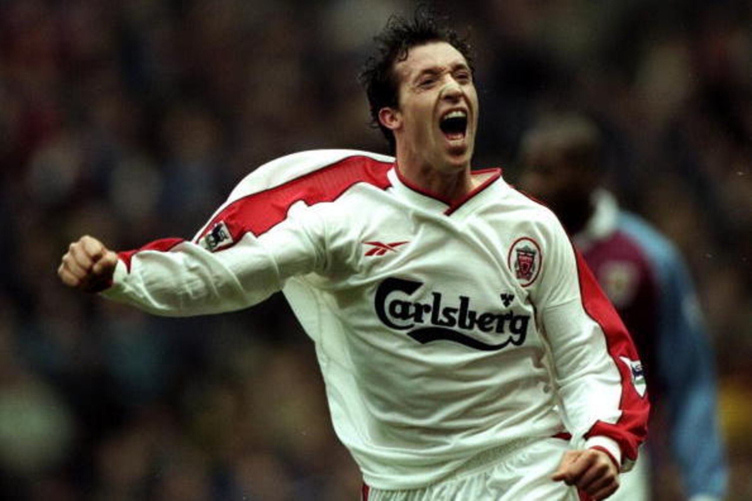 21 Nov 1998:  Robbie Fowler of Liverpool celebrates after completing his hat trick against Aston Villa during the FA Carling Premiership match at Villa Park in Birmingham, England. Liverpool won 4-2. \ Mandatory Credit: Ben Radford /Allsport