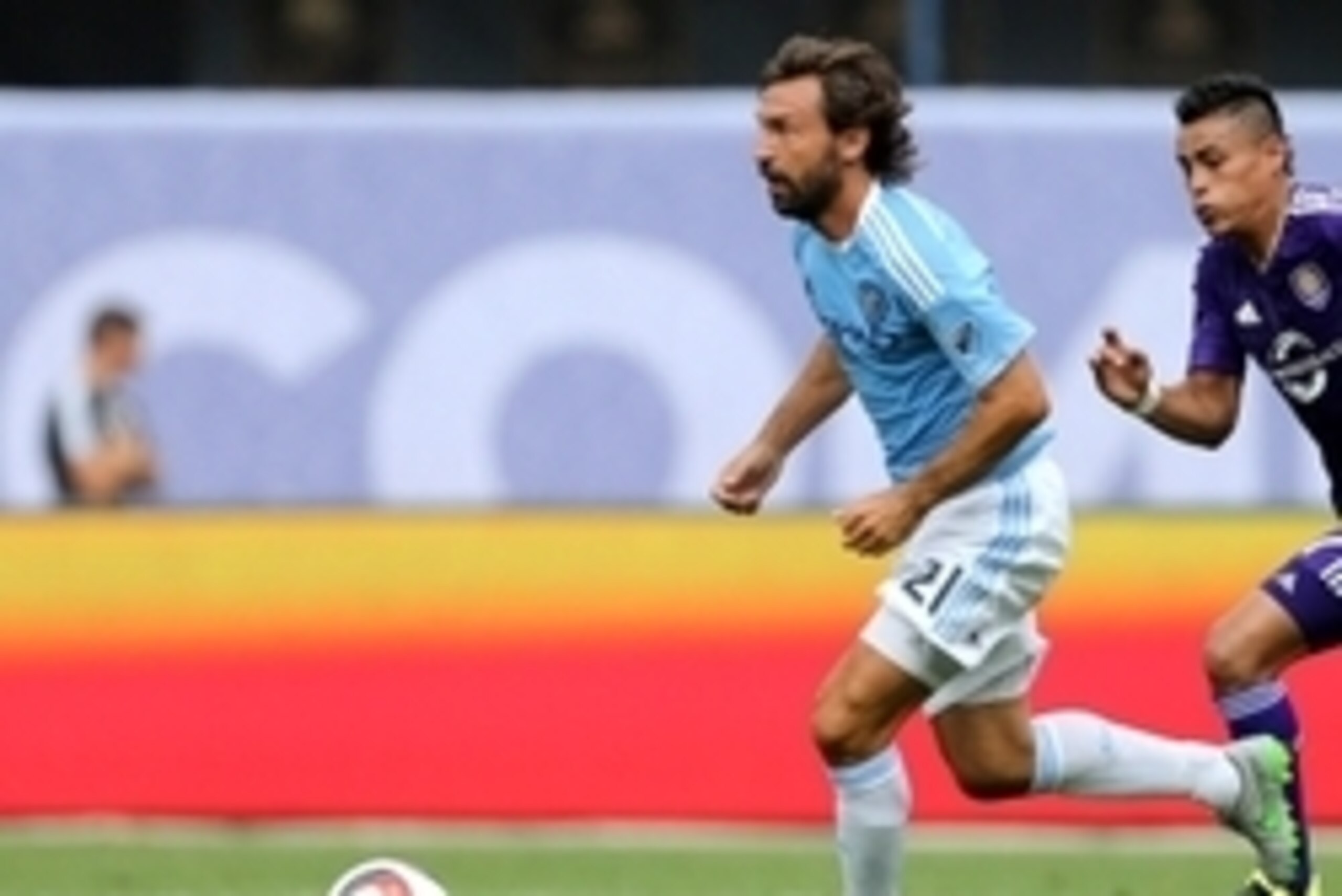 Jul 26, 2015; New York, NY, USA; New York City FC midfielder Andrea Pirlo (21) dribbles the ball against the Orlando City FC during the second half of a soccer match at Yankee Stadium. The New York City FC won 5-3. Mandatory Credit: Adam Hunger-USA TODAY Jul 26, 2015; New York, NY, USA; New York City FC midfielder Andrea Pirlo (21) dribbles the ball against the Orlando City FC during the second half of a soccer match at Yankee Stadium. The New York City FC won 5-3. Mandatory Credit: Adam Hunger-USA TODAY
