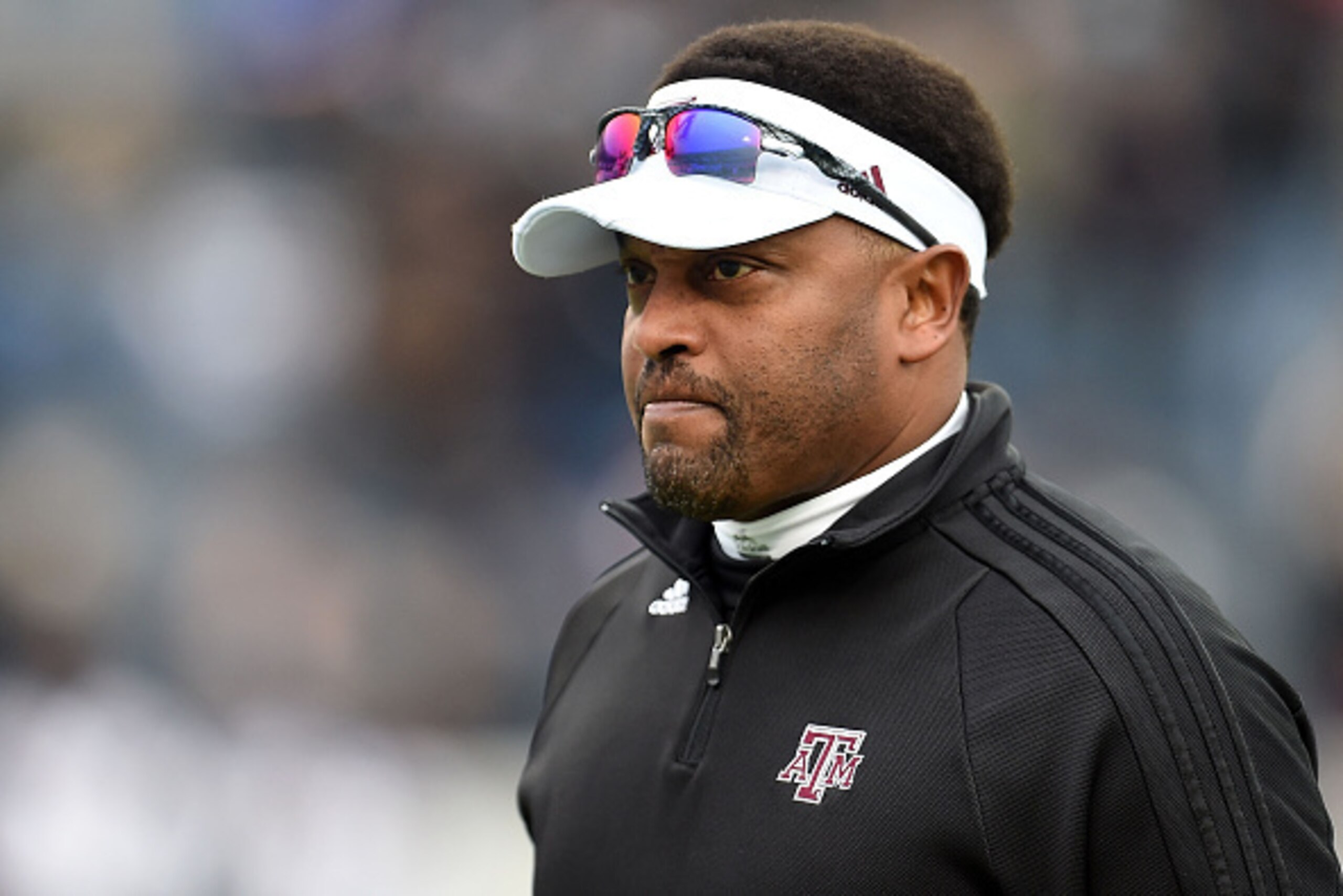 MEMPHIS, TN - DECEMBER 29:  Head coach Kevin Sumlin of the Texas A&M Aggies watches his team prior to a game against the West Virginia Mountaineers in the 56th annual Autozone Liberty Bowl at Liberty Bowl Memorial Stadium on December 29, 2014 in Memphis, 