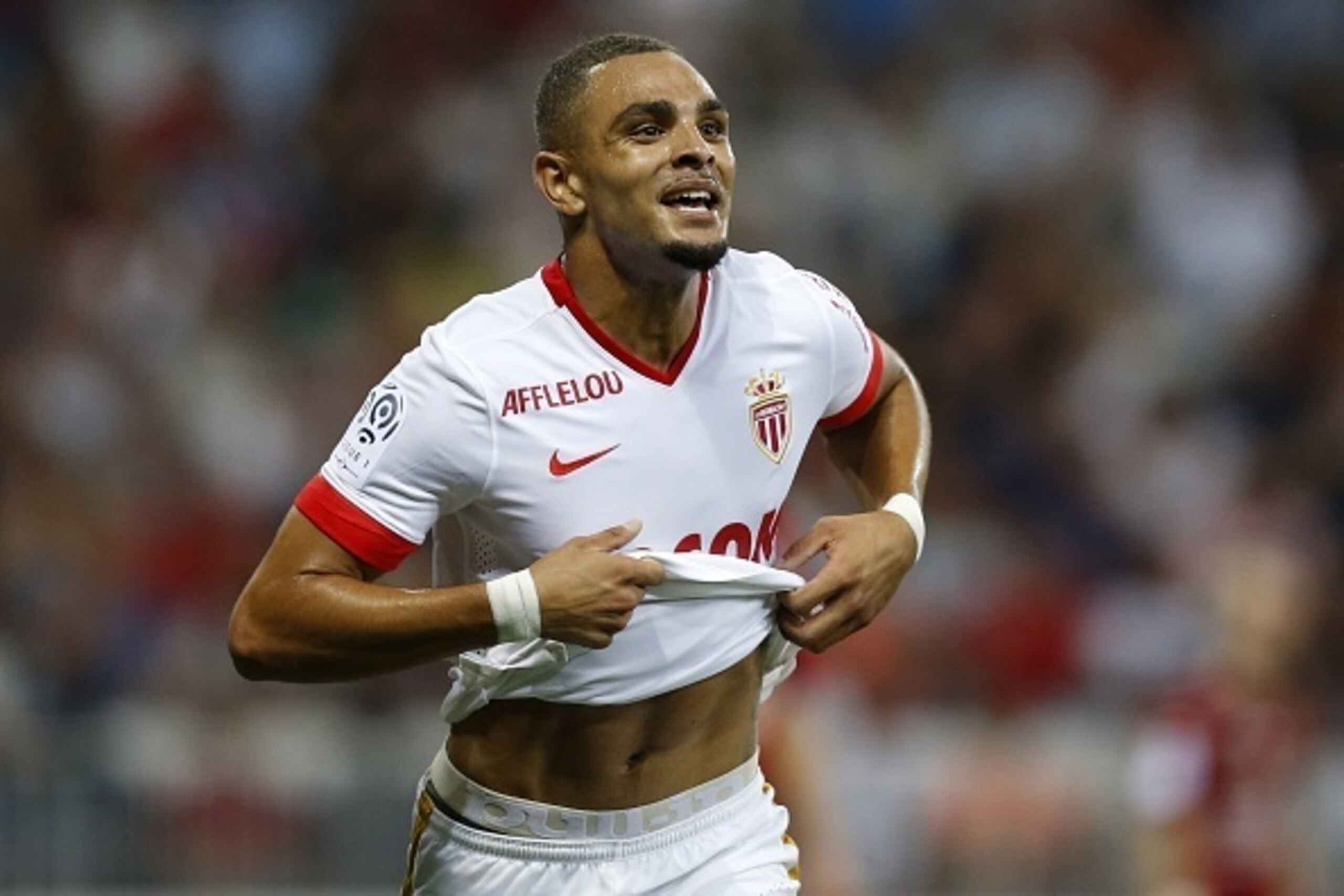 Monaco's French defender Layvin Kurzawa celebrates after scoring his team's second goal during the French L1 football match between Nice and Monaco at the Allianz Riviera stadium in Nice, southeastern France, on August 8, 2015.  AFP PHOTO / VALERY HACHE  