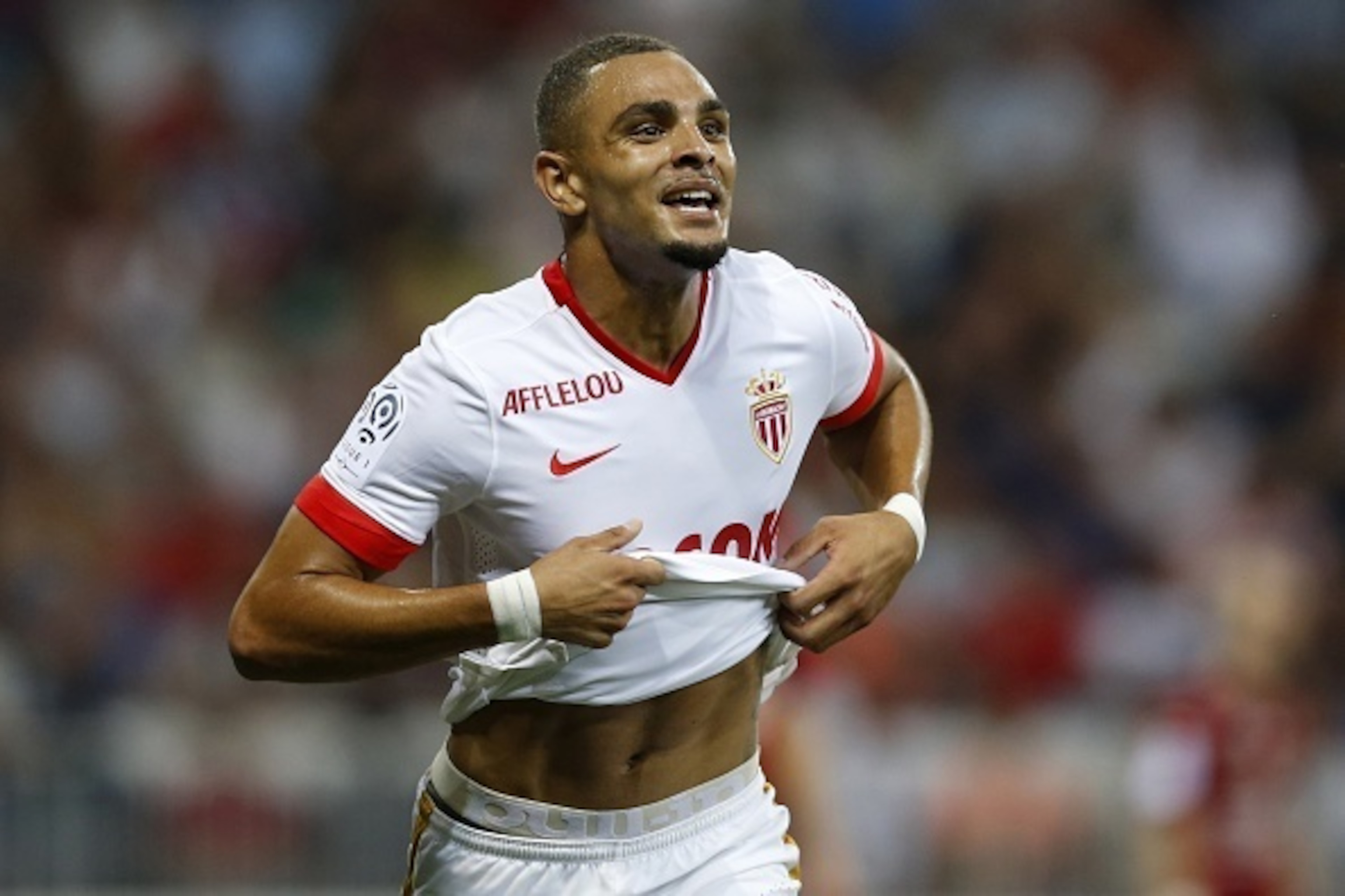 Monaco's French defender Layvin Kurzawa celebrates after scoring his team's second goal during the French L1 football match between Nice and Monaco at the Allianz Riviera stadium in Nice, southeastern France, on August 8, 2015.  AFP PHOTO / VALERY HACHE  