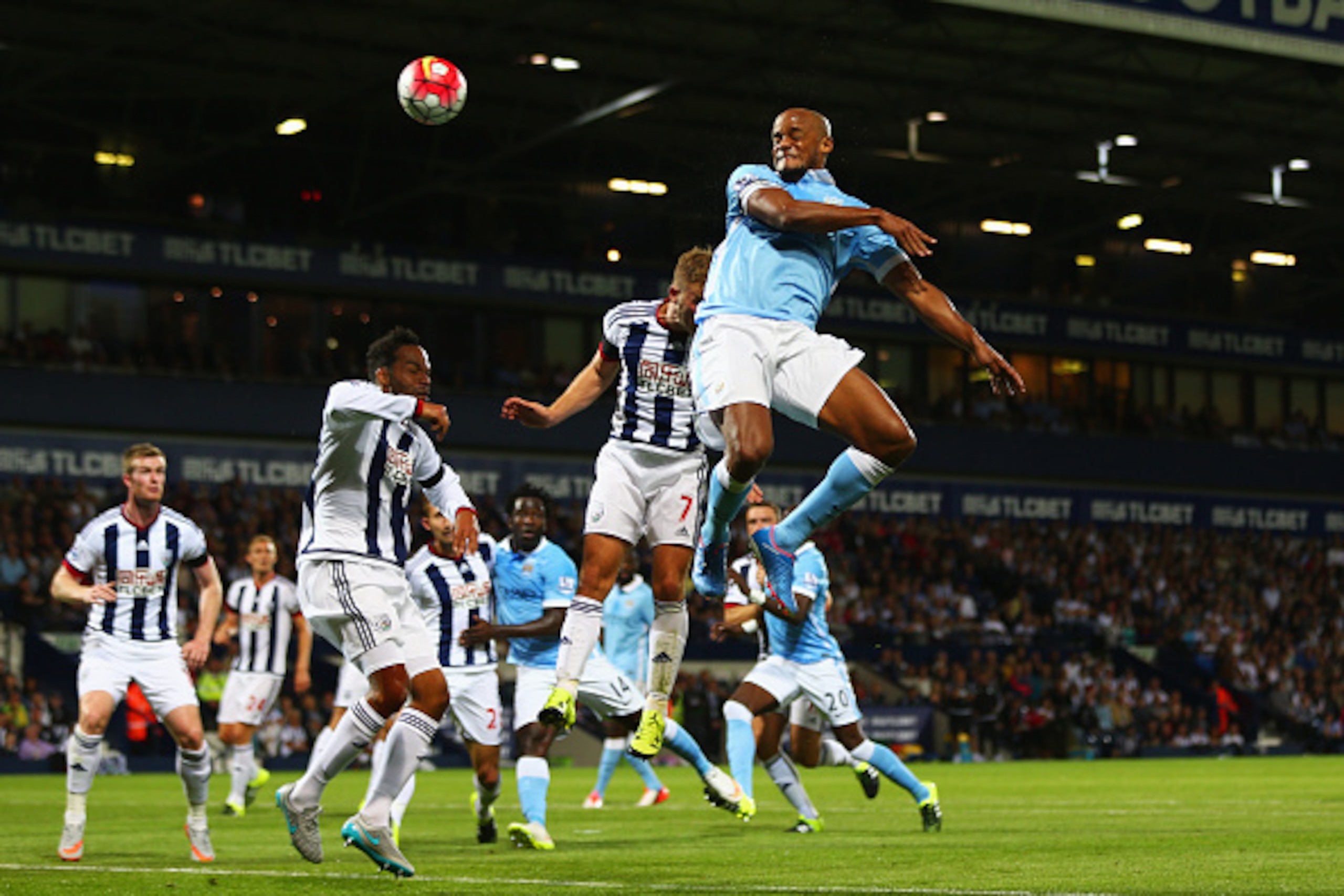 WEST BROMWICH, ENGLAND - AUGUST 10:  Vincent Kompany of Manchester City scores their third goal during the Barclays Premier League match between West Bromwich Albion and Manchester City at The Hawthorns on August 10, 2015 in West Bromwich, England.  (Phot