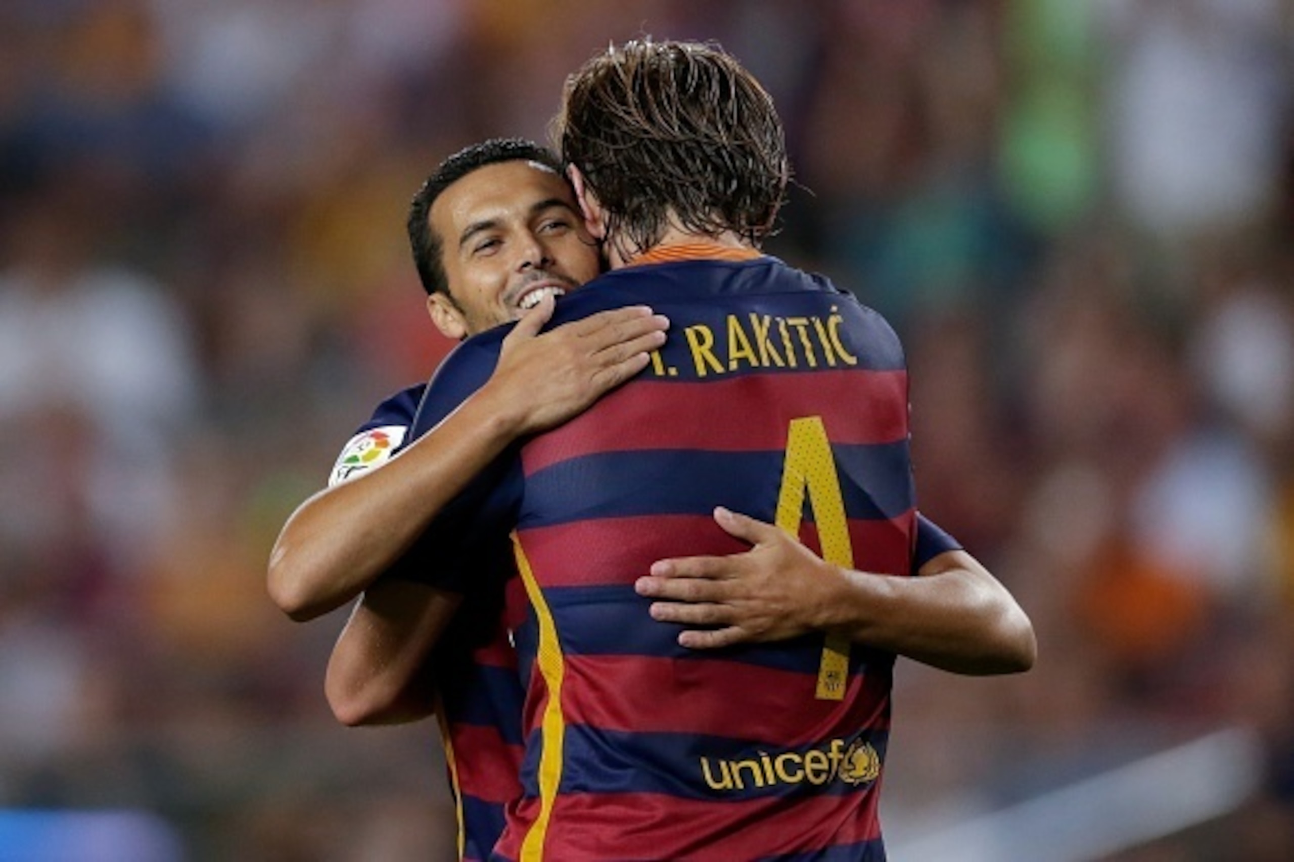 (L-R) Pedro Rodriguez Ledesma of FC Barcelona, Ivan Rakitic of FC Barcelona during the Joan Gamper Trophy match between Barcelona and AS Roma on August 5, 2015 at the Camp Nou stadium in Barcelona, Spain.(Photo by VI Images via Getty Images)