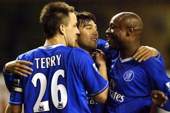 LONDON, UNITED KINGDOM:  Chelsea's captain John Terry (L), Paulo Ferreira (C) and Claude Makelele (R) celebrate their victory over Tottenham during their Premiership football match, 15 January 2005 at White Hart Lane in London. Chelsea beat Tottenham 2-0.