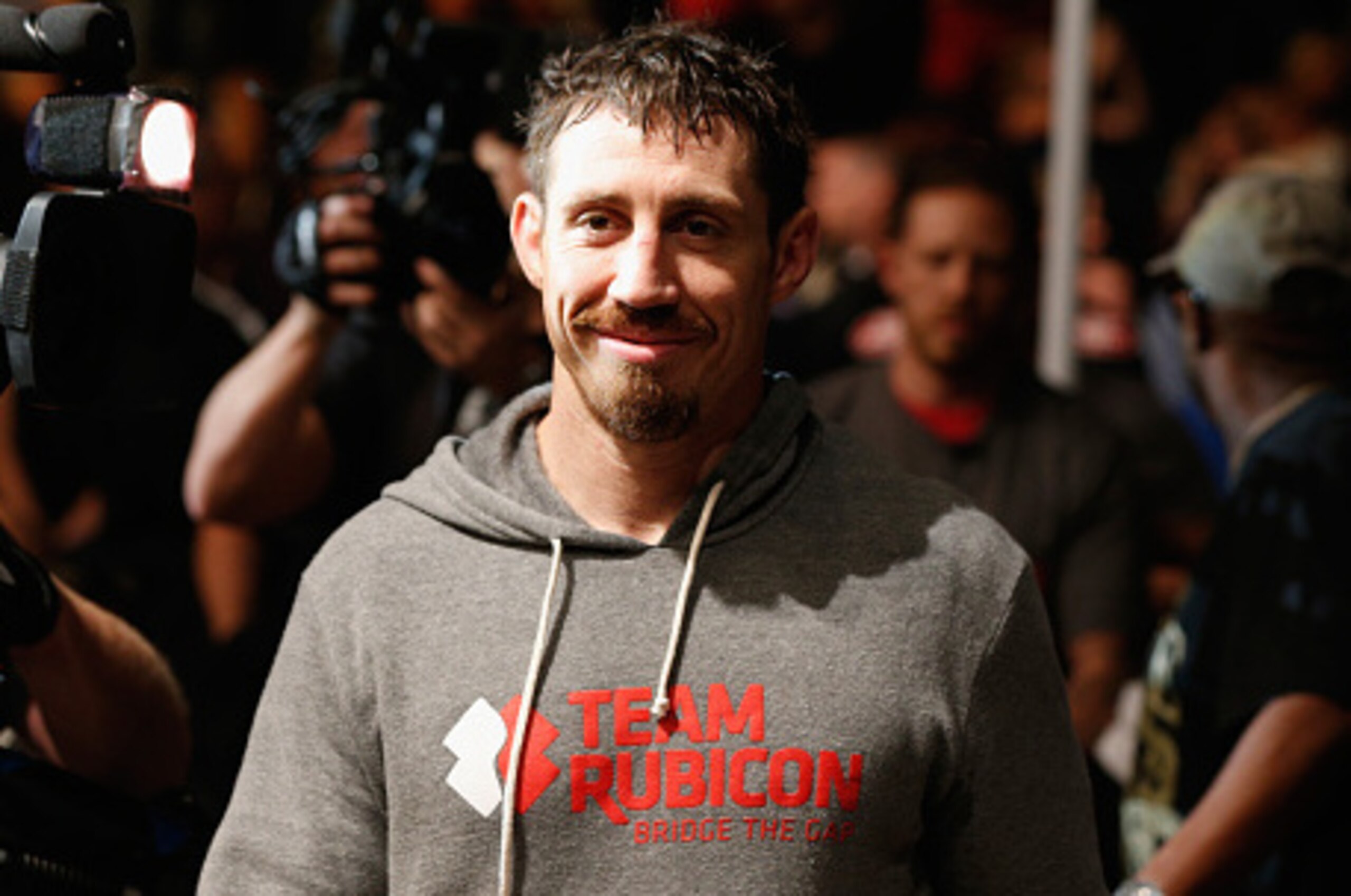 LAS VEGAS, NV - SEPTEMBER 27:  Tim Kennedy enters the arena for his fight with Yoel Romero before their middleweight fight during the UFC 178 event inside the MGM Grand Garden Arena on September 27, 2014 in Las Vegas, Nevada.  (Photo by Josh Hedges/Zuffa 