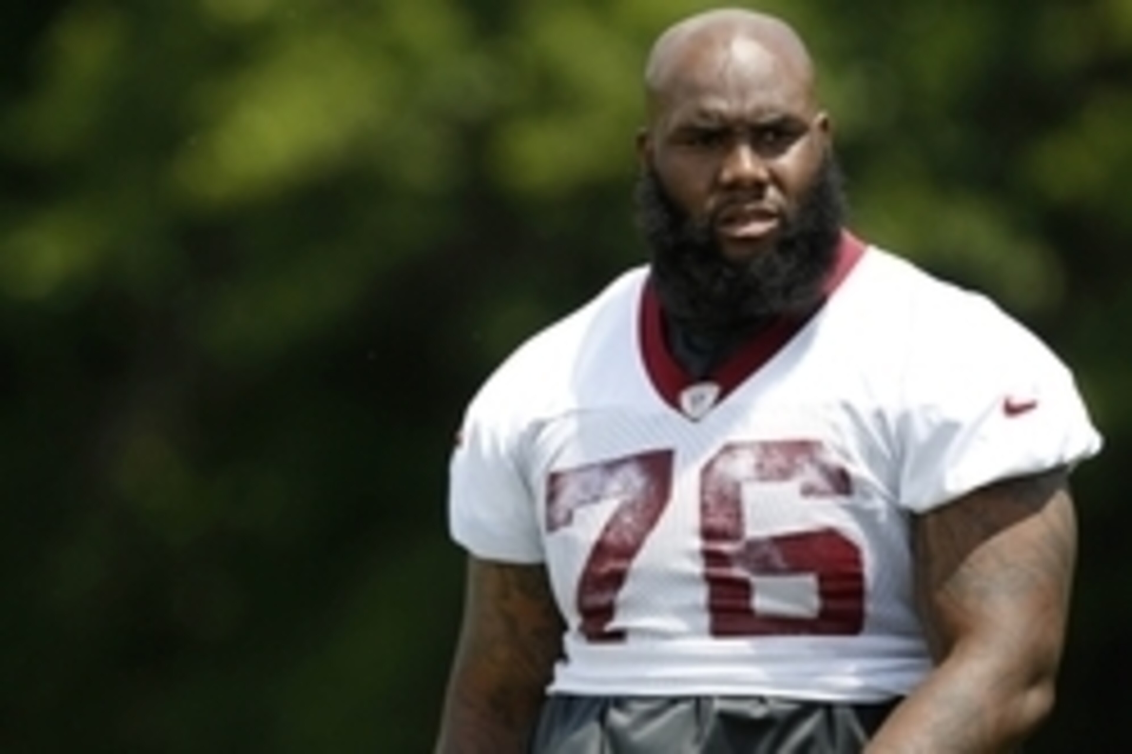 May 26, 2015; Ashbury, VA, USA; Washington Redskins tackle Morgan Moses (76) walks off the field after the Redskins OTA at Redskins Park. Mandatory Credit: Geoff Burke-USA TODAY Sports
