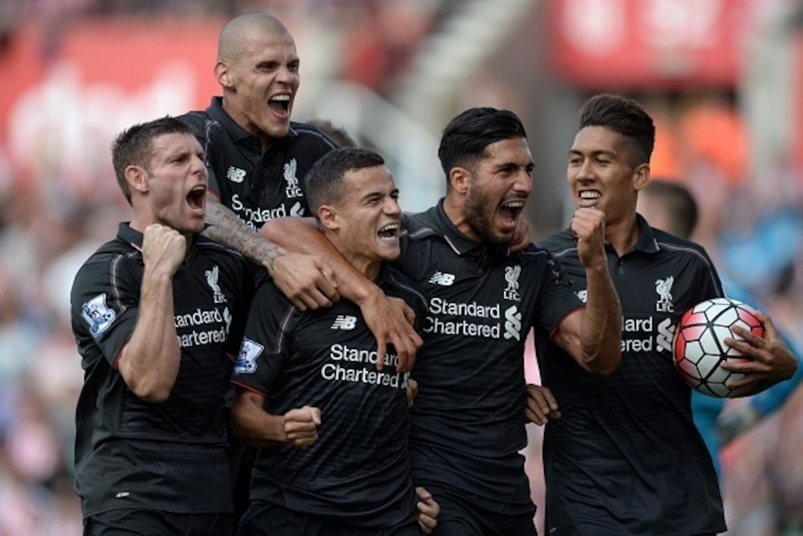 (L-R) Liverpool's English midfielder James Milner, Liverpool's Slovakian defender Martin Skrtel, Liverpool's Brazilian midfielder Philippe Coutinho, Liverpool's German midfielder Emre Can and Liverpool's Brazilian midfielder Roberto Firmino celebrate afte