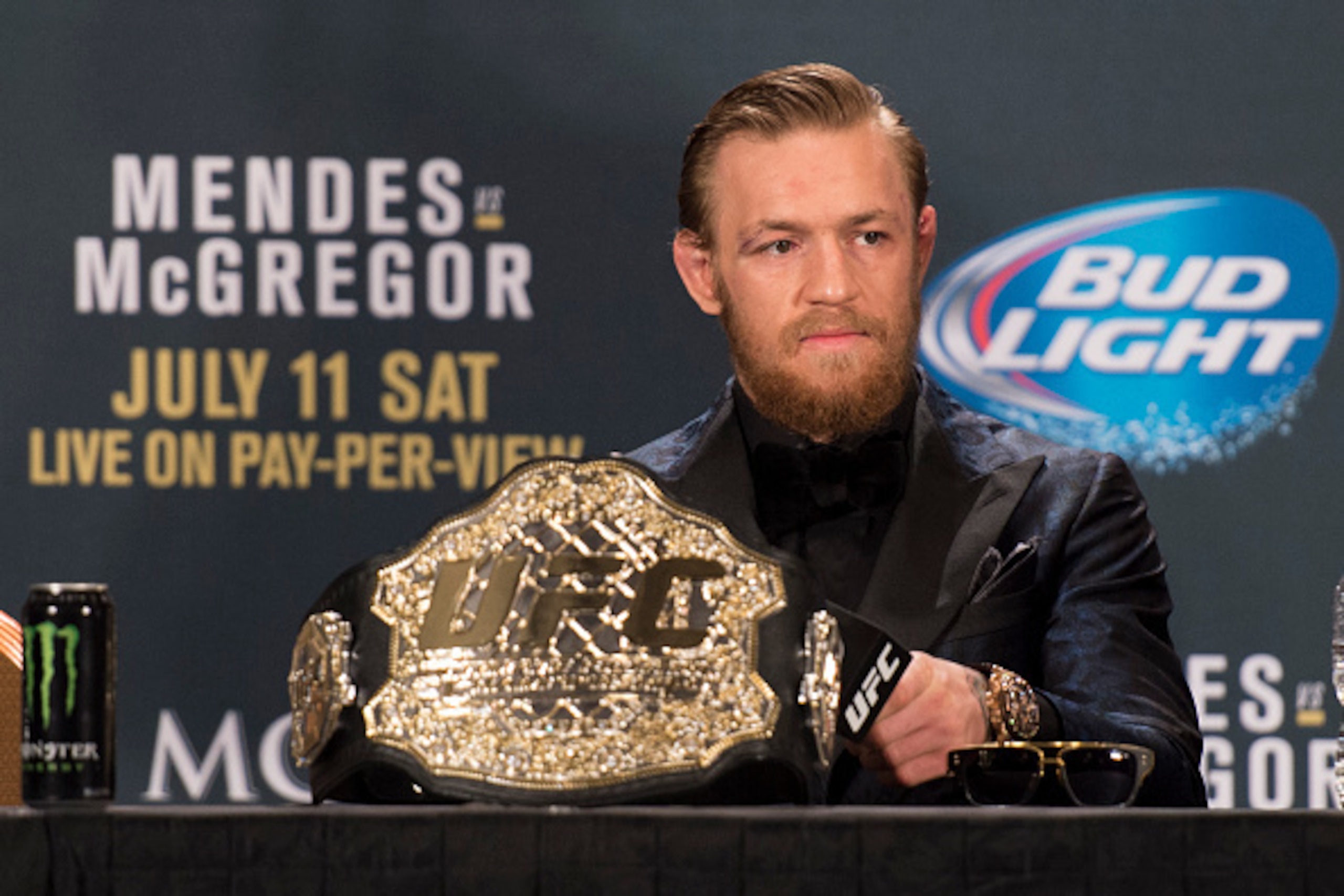 LAS VEGAS, NV - JULY 11:  UFC interim featherweight champion Conor McGregor interacts with the media during the UFC 189 post fight press conference at the MGM Grand Garden Arena on July 11, 2015 in Las Vegas, Nevada. (Photo by Jeff Bottari/Zuffa LLC/Zuffa