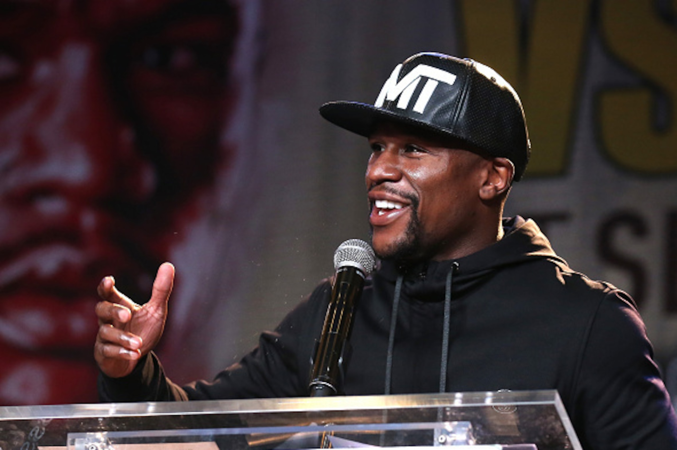LOS ANGELES, CA - AUGUST 06:  Floyd Mayweather  speaks at a press conference ahead of his upcoming fight with Andre Berto at JW Marriott Los Angeles at L.A. LIVE on August 6, 2015 in Los Angeles, California.  (Photo by Stephen Dunn/Getty Images)