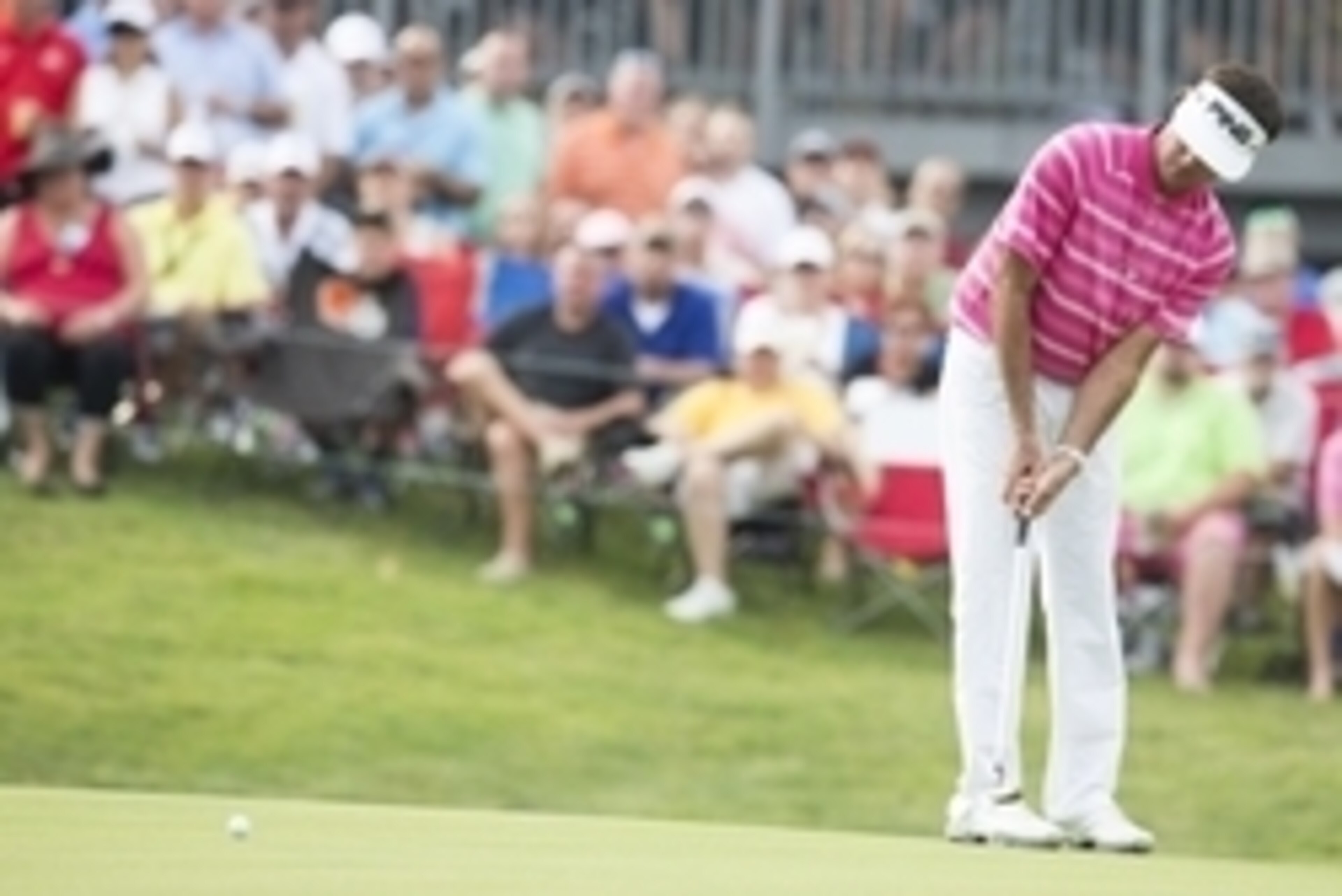 Aug 9, 2015; Akron, OH, USA; Bubba Watson putts on the eighteenth green during the final round of the Bridgestone Invitational at Firestone Country Club - South Course. Mandatory Credit: Greg Bartram-USA TODAY Sports Aug 9, 2015; Akron, OH, USA; Bubba Watson putts on the eighteenth green during the final round of the Bridgestone Invitational at Firestone Country Club - South Course. Mandatory Credit: Greg Bartram-USA TODAY Sports