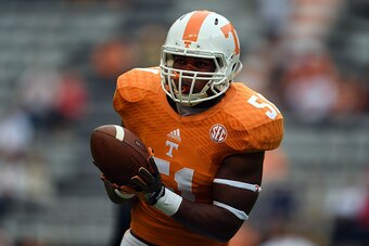 KNOXVILLE, TN - OCTOBER 11:  Kenny Bynum #51 of the Tennessee Volunteers participates in warmups prior to a game against the Chattanooga Mocs at Neyland Stadium on October 11, 2014 in Knoxville, Tennessee. Tennessee won the game 45-10.  (Photo by Stacy Re