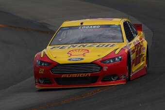 WATKINS GLEN, NY - AUGUST 08: Joey Logano, driver of the #22 Shell Pennzoil Ford, races during qualifying for the NASCAR Sprint Cup Series Cheez-It 355 at Watkins Glen International on August 8, 2015 in Watkins Glen, New York.  (Photo by Matt Sullivan/Get