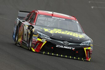 INDIANAPOLIS, IN - JULY 26:  Clint Bowyer, driver of the #15 5-Hour Energy Toyota, races during the NASCAR Sprint Cup Series Crown Royal Presents the Jeff Kyle 400 at the Brickyard at Indianapolis Motor Speedway on July 26, 2015 in Indianapolis, Indiana. 