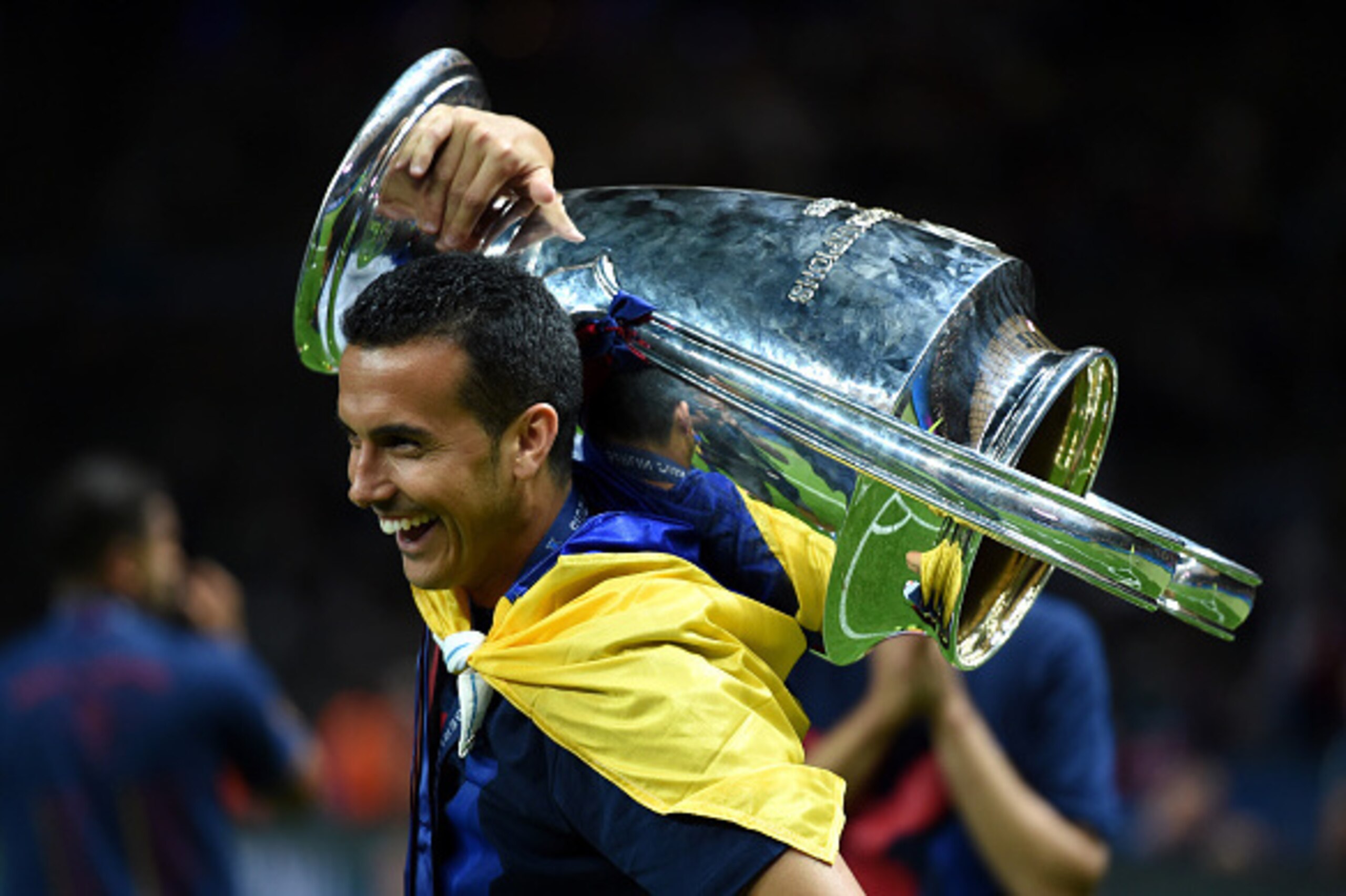 BERLIN, GERMANY - JUNE 06:  Pedro of Barcelona celebrates with the trophy after the UEFA Champions League Final between Juventus and FC Barcelona at Olympiastadion on June 6, 2015 in Berlin, Germany.  (Photo by Matthias Hangst/Getty Images)