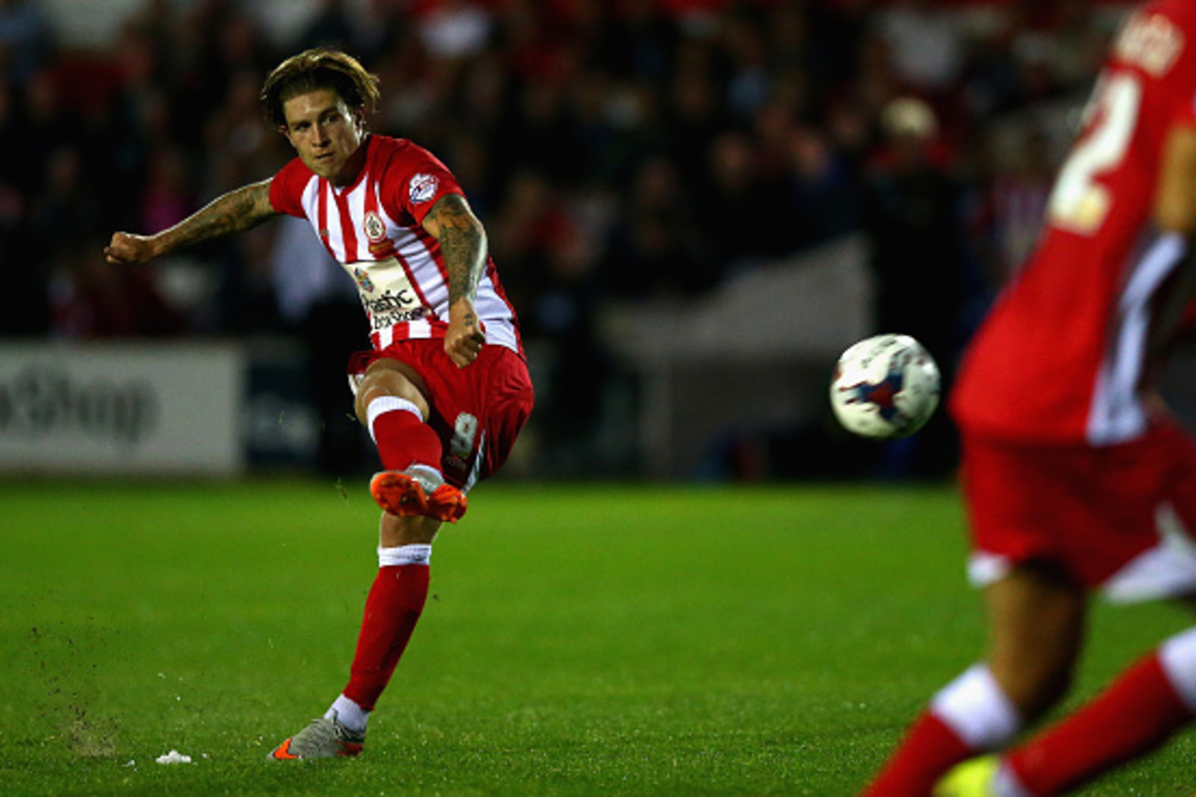 ACCRINGTON, ENGLAND - AUGUST 11:  Josh Windass of Accrington Stanley takes a free kick during the Capital One Cup First Round match between Accrington Stanley and Hull City at Wham Stadium on August 11, 2015 in Accrington, England.  (Photo by Clive Brunsk
