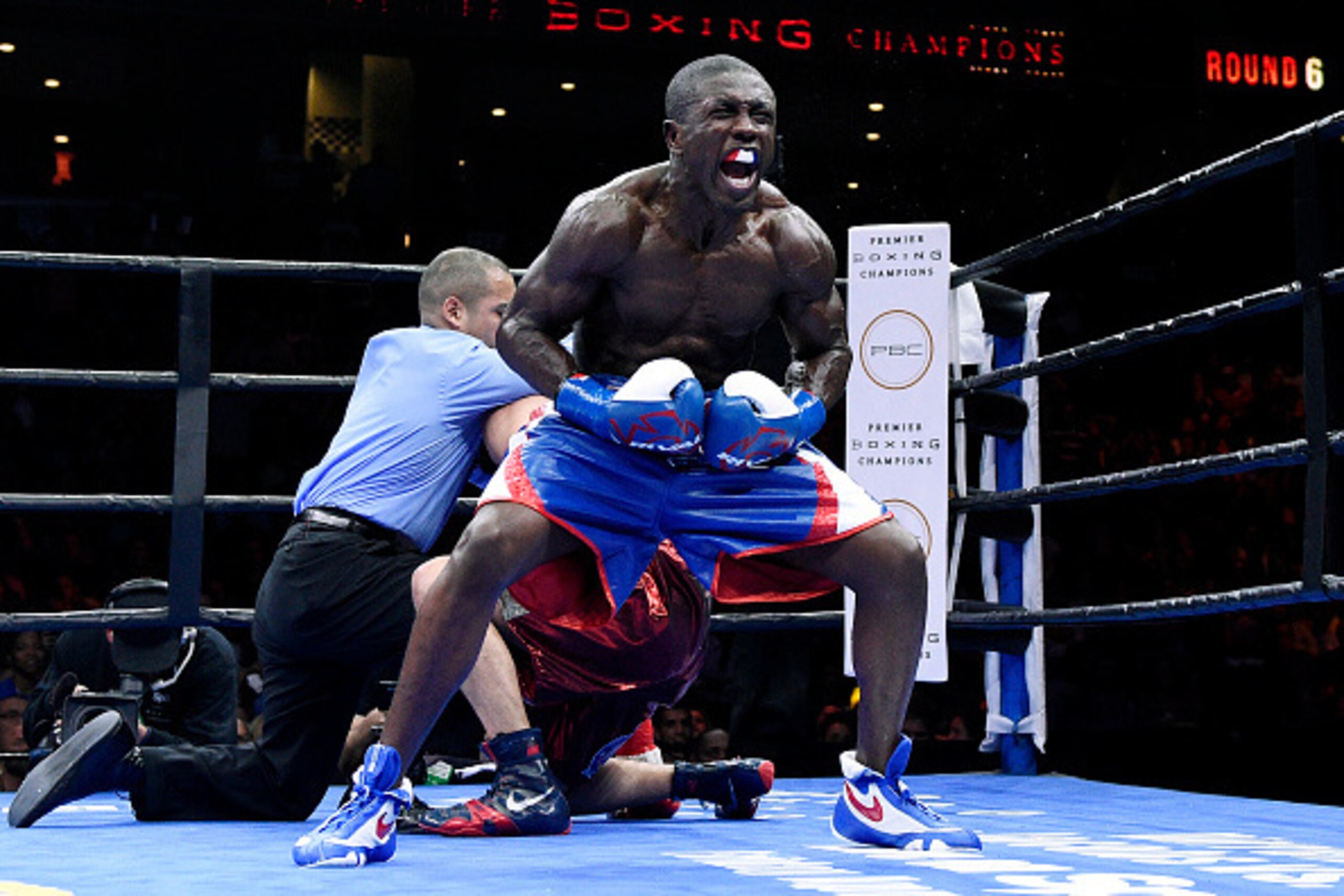 ONTARIO, CA - MARCH 13: Andre Berto (C) celebrates after knocking out Josesito Lopez in the 6 round of their 12 round welterweight bout at Citizens Business Bank Arena March 13, 2015 in Ontario, California. (Photo by Kevork Djansezian/Getty Images)
