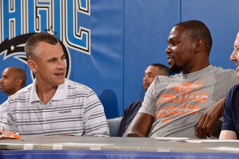 ORLANDO, FL - JULY 4: Billy Donovan and Kevin Durant #35 of the Oklahoma City Thunder sit on the sideline during a game against the Charlotte Hornets on July 4, 2015 at Amway Center in Orlando, Florida. NOTE TO USER: User expressly acknowledges and agrees