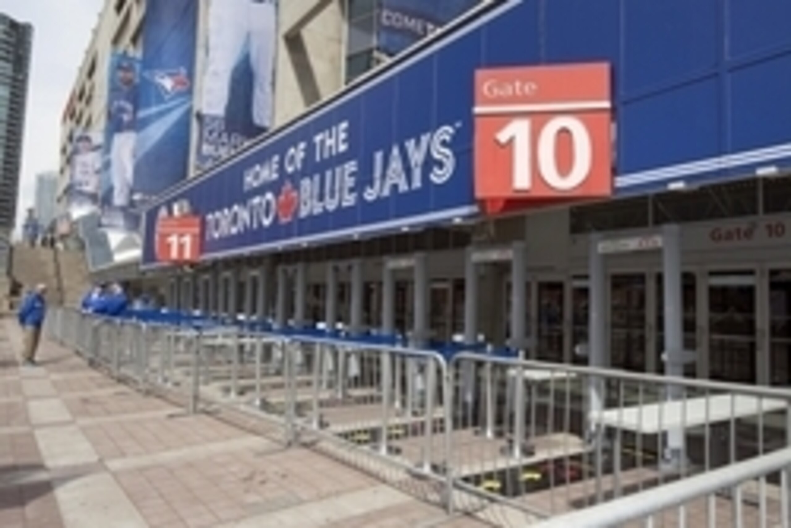 Apr 13, 2015; Toronto, Ontario, CAN; New Security measures implemented by Major League Baseball stand ready for screening fans at Gate 10 of the Rogers Centre before the home opener between the Toronto Blue Jays and the Tampa Bay Rays. Mandatory Credit: N