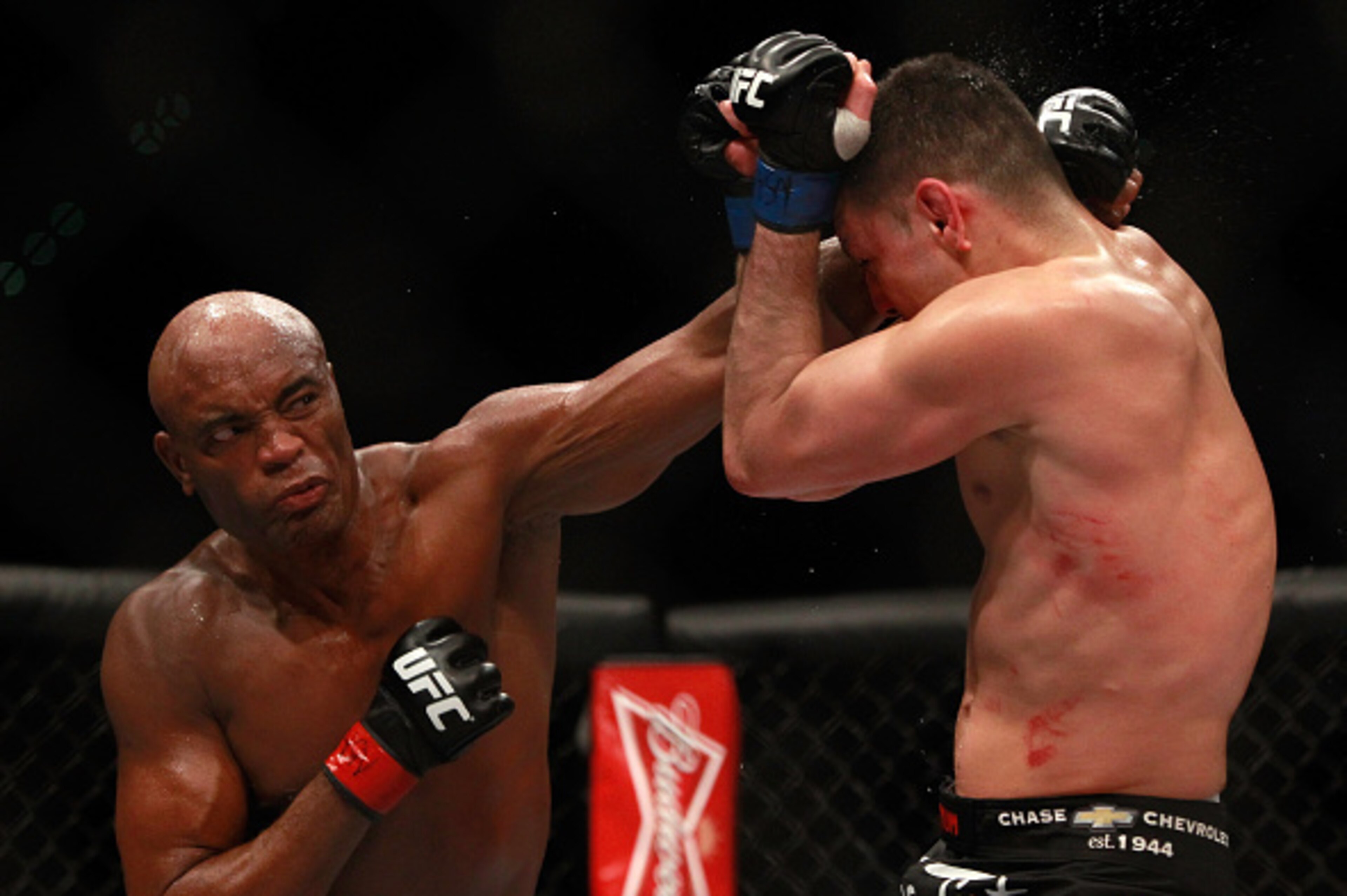 LAS VEGAS, NV - JANUARY 31:  Anderson Silva punches at Nick Diaz in their middleweight bout during UFC 183 at the MGM Grand Garden Arena on January 31, 2015 in Las Vegas, Nevada. Silva won by unanimous decision.  (Photo by Steve Marcus/Getty Images)