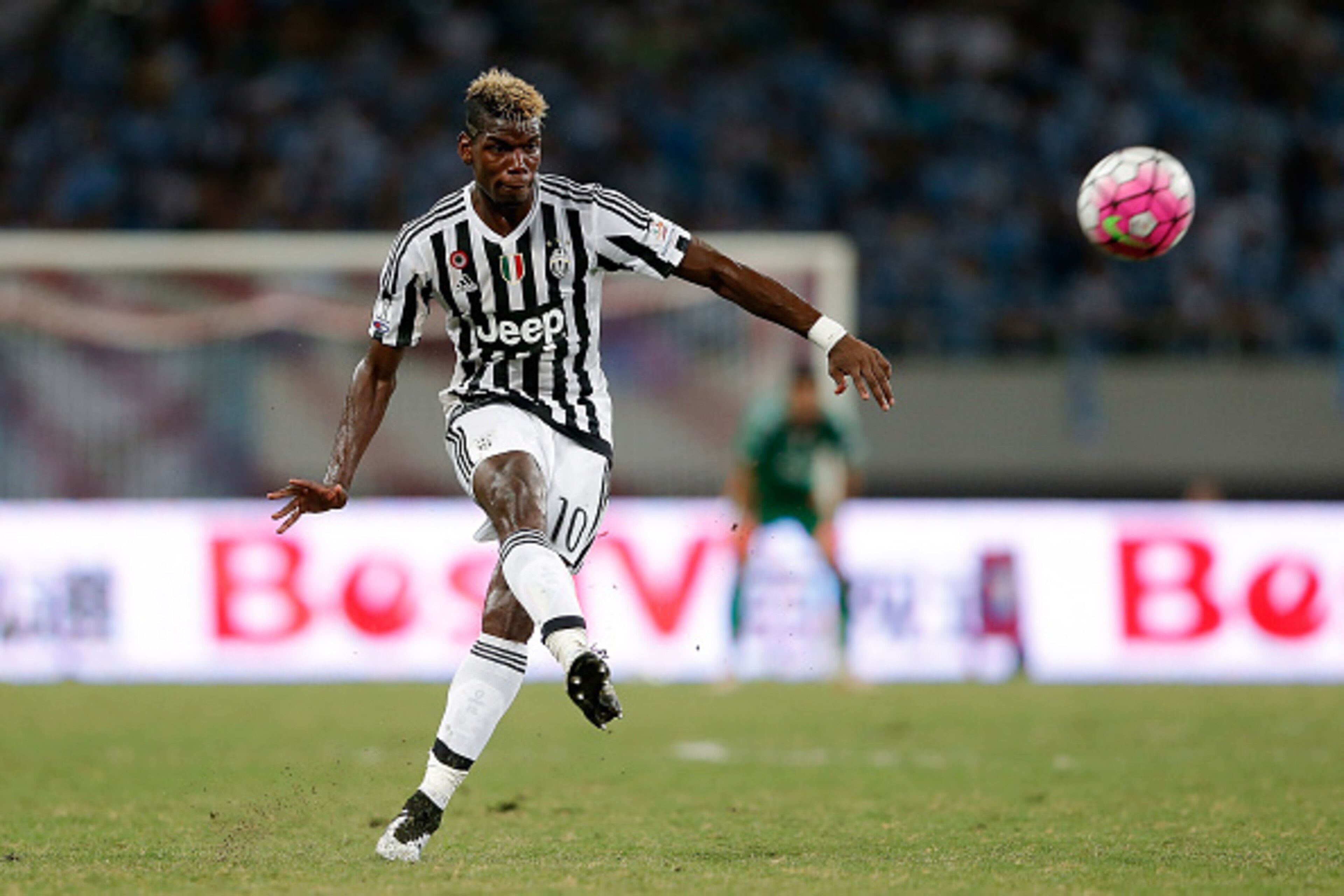 SHANGHAI, CHINA - AUGUST 08:  Paul Labile Pogba of Juventus FC in action during the Italian Super Cup final football match between Juventus and Lazio at Shanghai Stadium on August 8, 2015 in Shanghai, China.  (Photo by Lintao Zhang/Getty Images)