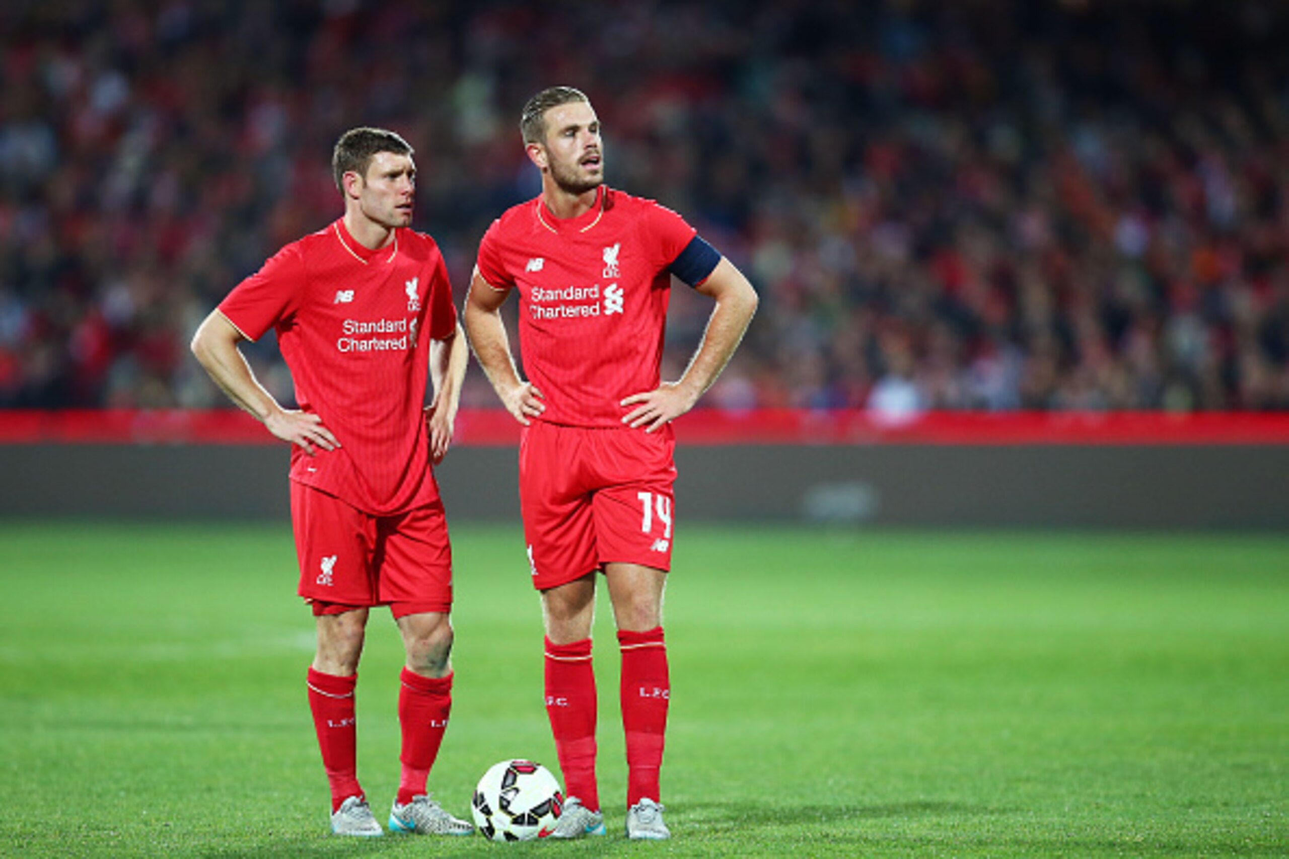 ADELAIDE, AUSTRALIA - JULY 20:  James Milner (L) of Liverpool talks to Jordan Henderson of Liverpool (R) during the international friendly match between Adelaide United and Liverpool FC at Adelaide Oval on July 20, 2015 in Adelaide, Australia.  (Photo by 