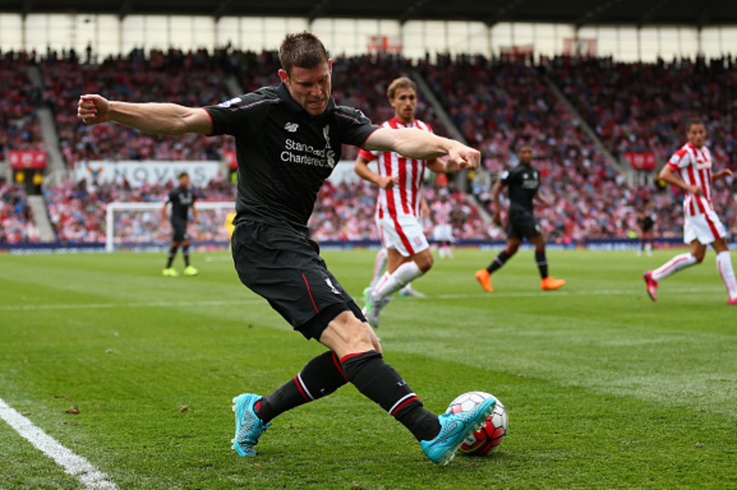 STOKE ON TRENT, ENGLAND - AUGUST 09:  James Milner of Liverpool in action during the Barclays Premier League match between Stoke City and Liverpool at Britannia Stadium on August 9, 2015 in Stoke on Trent, England.  (Photo by Clive Brunskill/Getty Images)