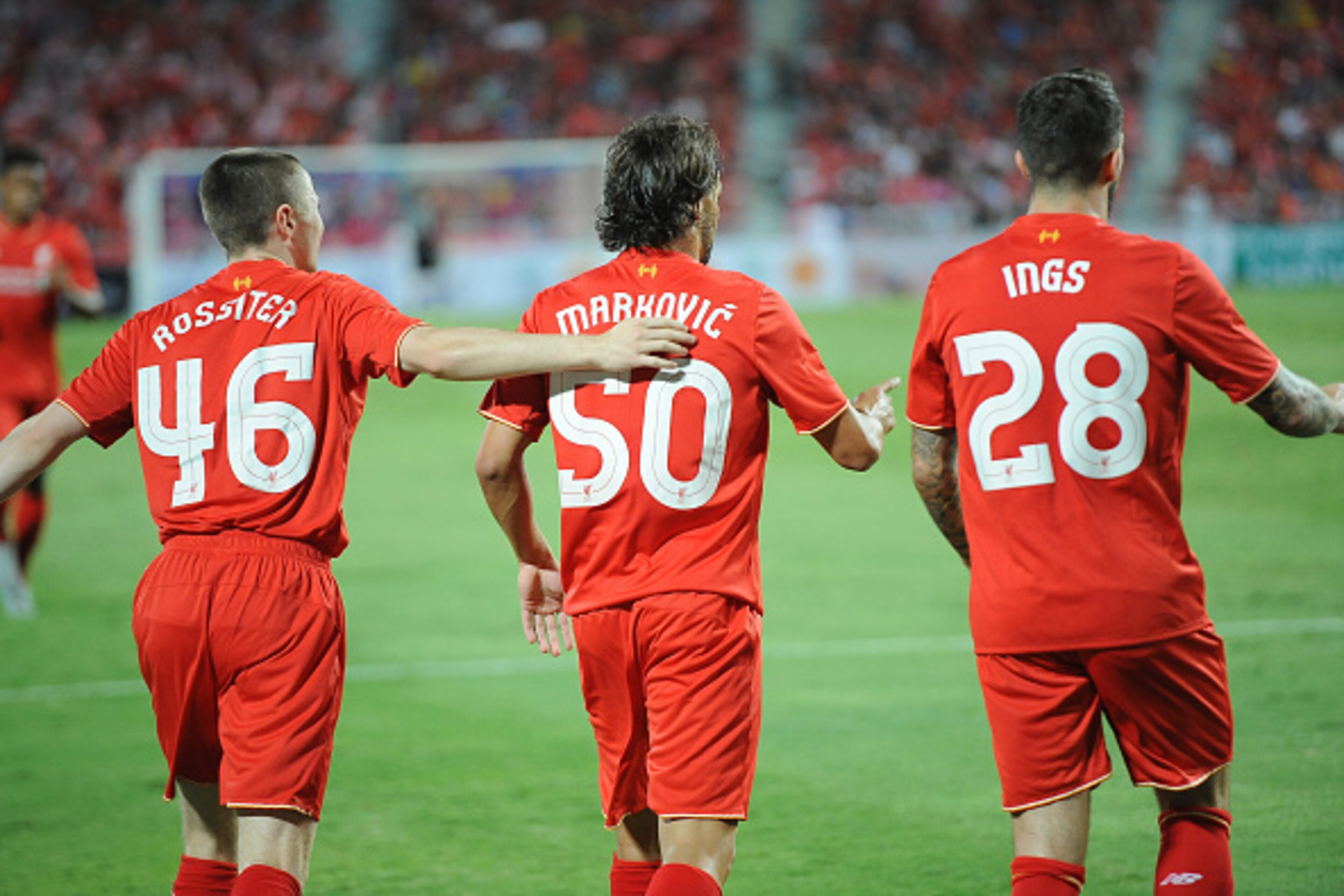 BANGKOK, THAILAND - JULY 14: (L-R) Jordan Rossiter, Lazar Markovic, and Danny Ings of Liverpool celebrate their goal during the international friendly match between Thai Premier League All Stars and Liverpool FC at Rajamangala Stadium on July 14, 2015 in 