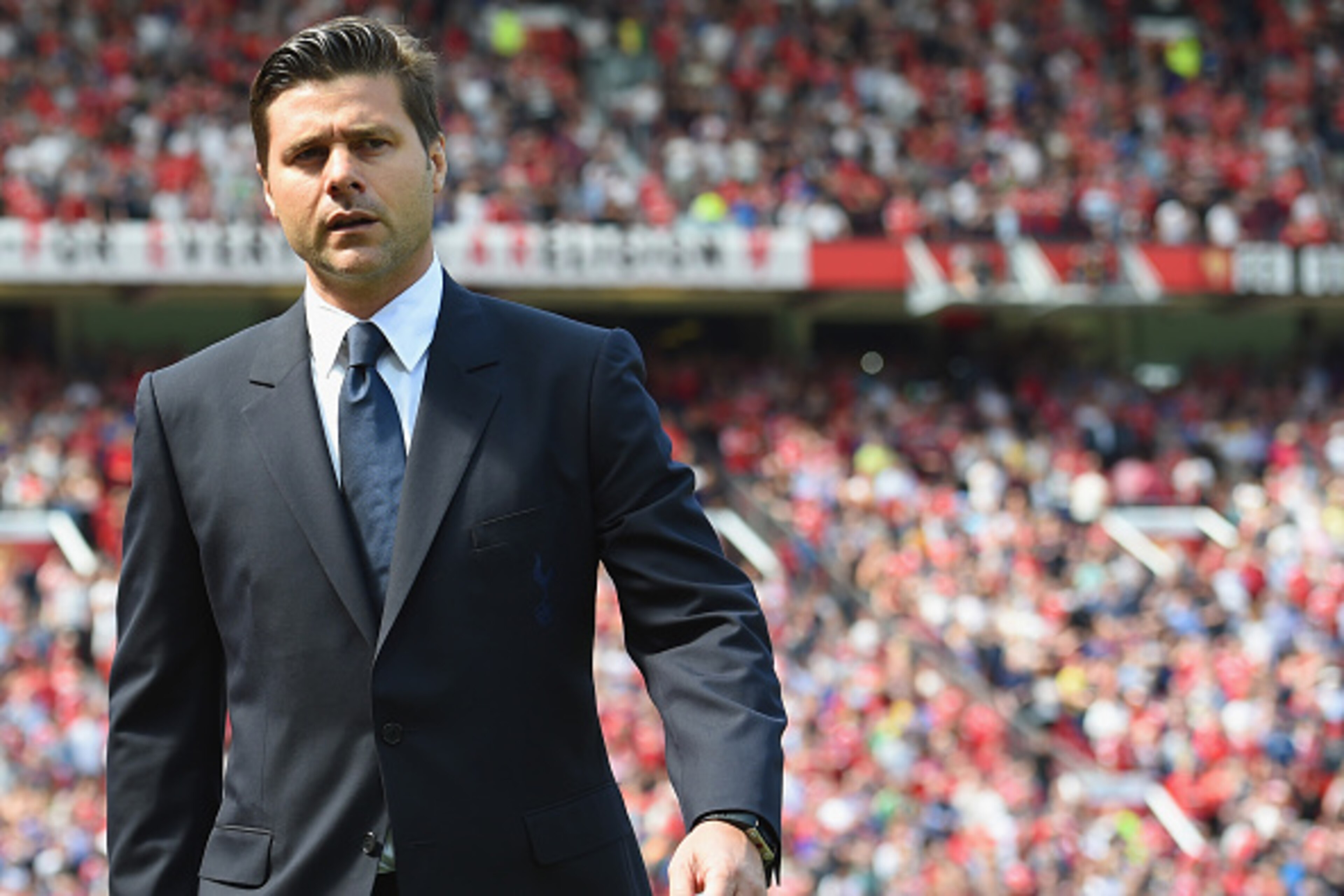 MANCHESTER, ENGLAND - AUGUST 08:  Tottenham manager Mauricio Pochettino looks on during the Barclays Premier League match between Manchester United and and Tottingham Hotspur at Old Trafford, Manchester.  (Photo by Michael Regan/Getty Images)
