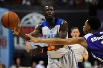 Jul 13, 2015; Las Vegas, NV, USA; New York Knicks guard Jerian Grant (13) passes the ball as Los Angeles Lakers guard D'angelo Russell (1) defends during an NBA Summer League game at Thomas & Mack Center. The Knicks won 76-66. Mandatory Credit: Stephen R.