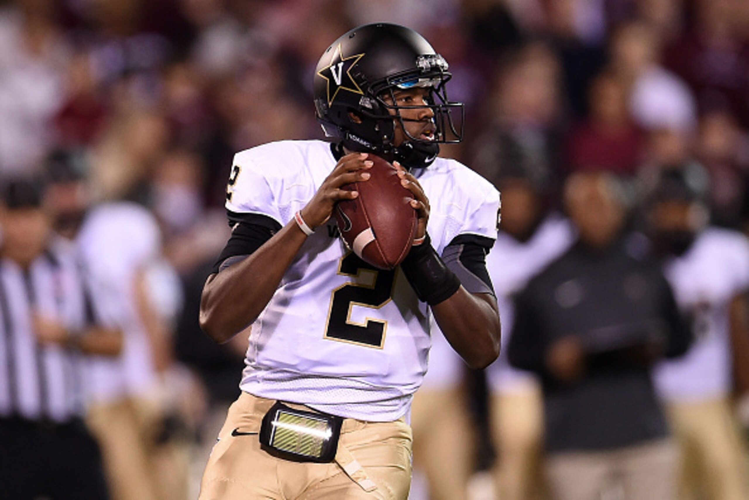 STARKVILLE, MS - NOVEMBER 22:  Johnny McCrary #2 of the Vanderbilt Commodores drops back to pass during a game against the Mississippi State Bulldogs at Davis Wade Stadium on November 22, 2014 in Starkville, Mississippi. Mississippi State won the game 51-