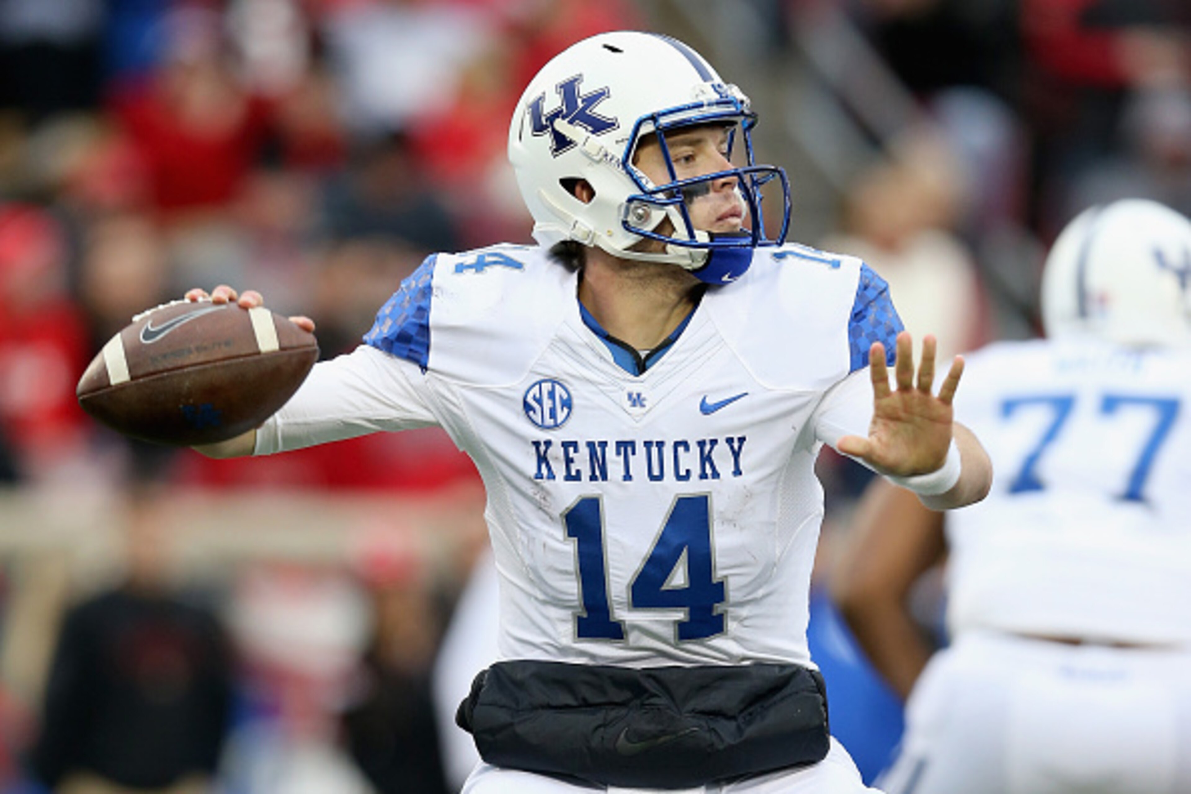 LOUISVILLE, KY - NOVEMBER 29:  Patrick Towles #14 of the Kentucky Wildcats throws a pass during the game against the Louisville Cardinals at Papa John's Cardinal Stadium on November 29, 2014 in Louisville, Kentucky.  (Photo by Andy Lyons/Getty Images)