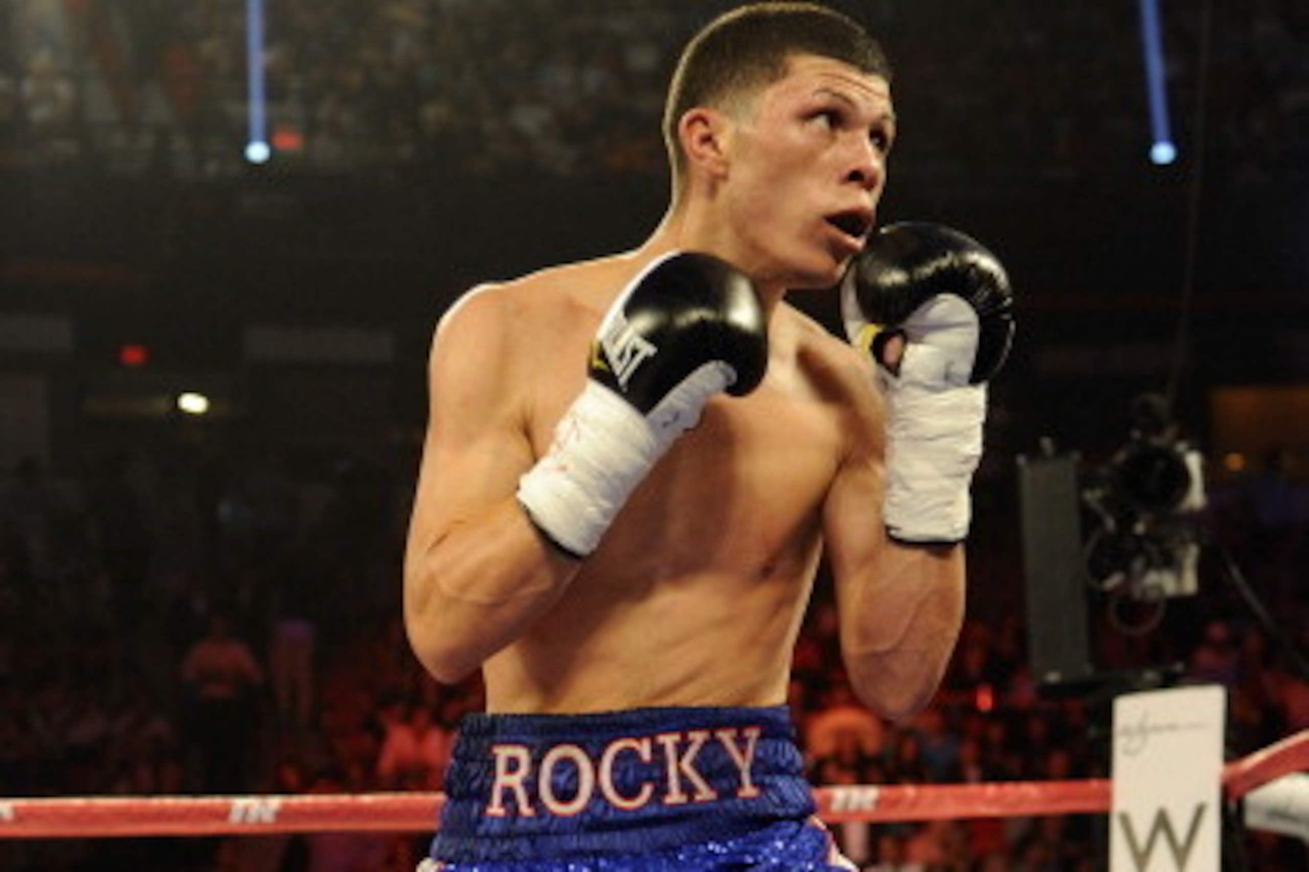 LAS VEGAS, NV - SEPTEMBER 15:  Roman Martinez looks to throw a punch at Miguel Beltran Jr. during their WBO Super Featherweight title fight at the Thomas & Mack Center on September 15, 2012 in Las Vegas, Nevada.  (Photo by Jeff Bottari/Getty Images)