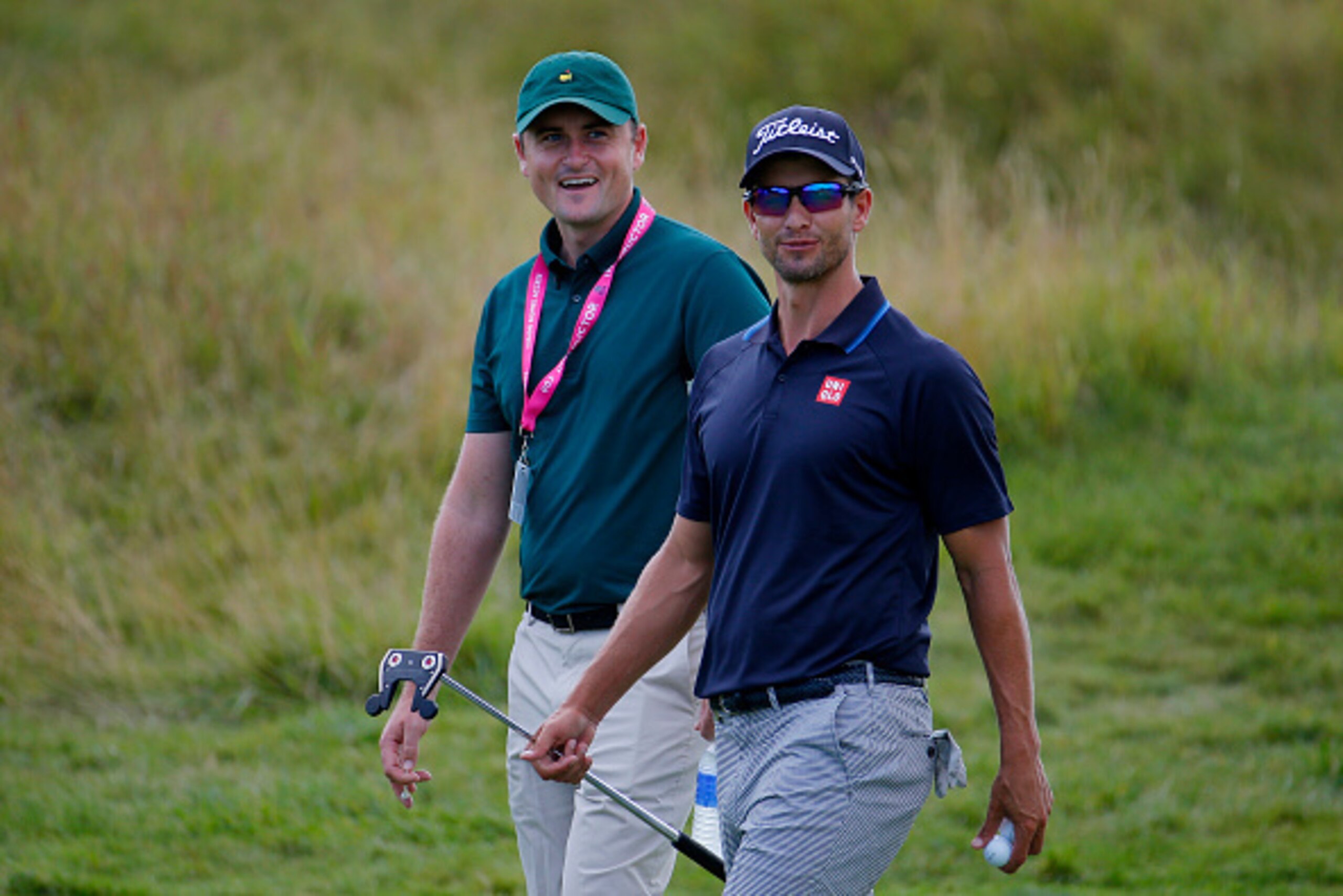 SHEBOYGAN, WI - AUGUST 11:  Adam Scott of Australia and coach and brother in law Brad Malone walk on a fairway during a practice round prior to the 2015 PGA Championship at Whistling Straits on August 11, 2015 in Sheboygan, Wisconsin.  (Photo by Kevin C. 