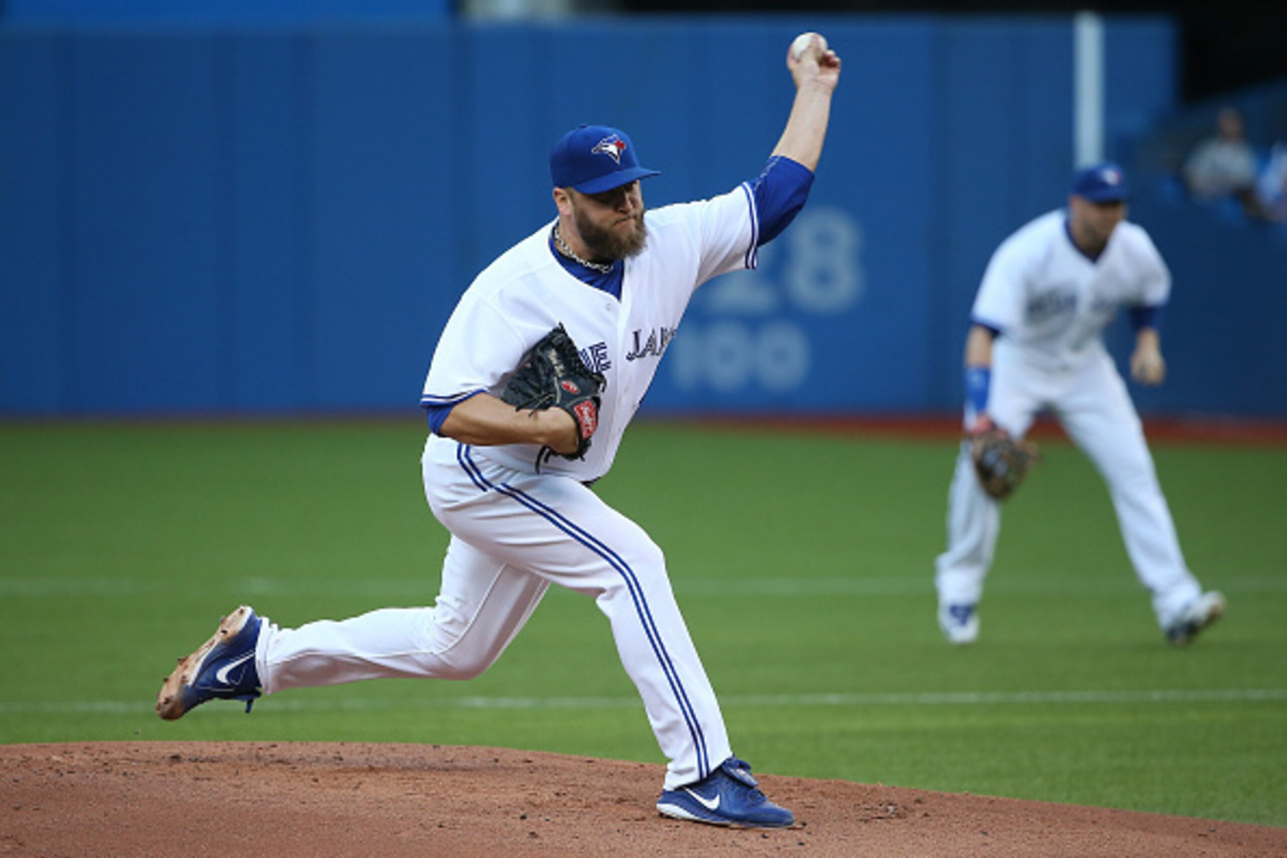 TORONTO, CANADA - AUGUST 6: Mark Buehrle #56 of the Toronto Blue Jays delivers a pitch in the first inning during MLB game action against the Minnesota Twins on August 6, 2015 at Rogers Centre in Toronto, Ontario, Canada. (Photo by Tom Szczerbowski/Getty 