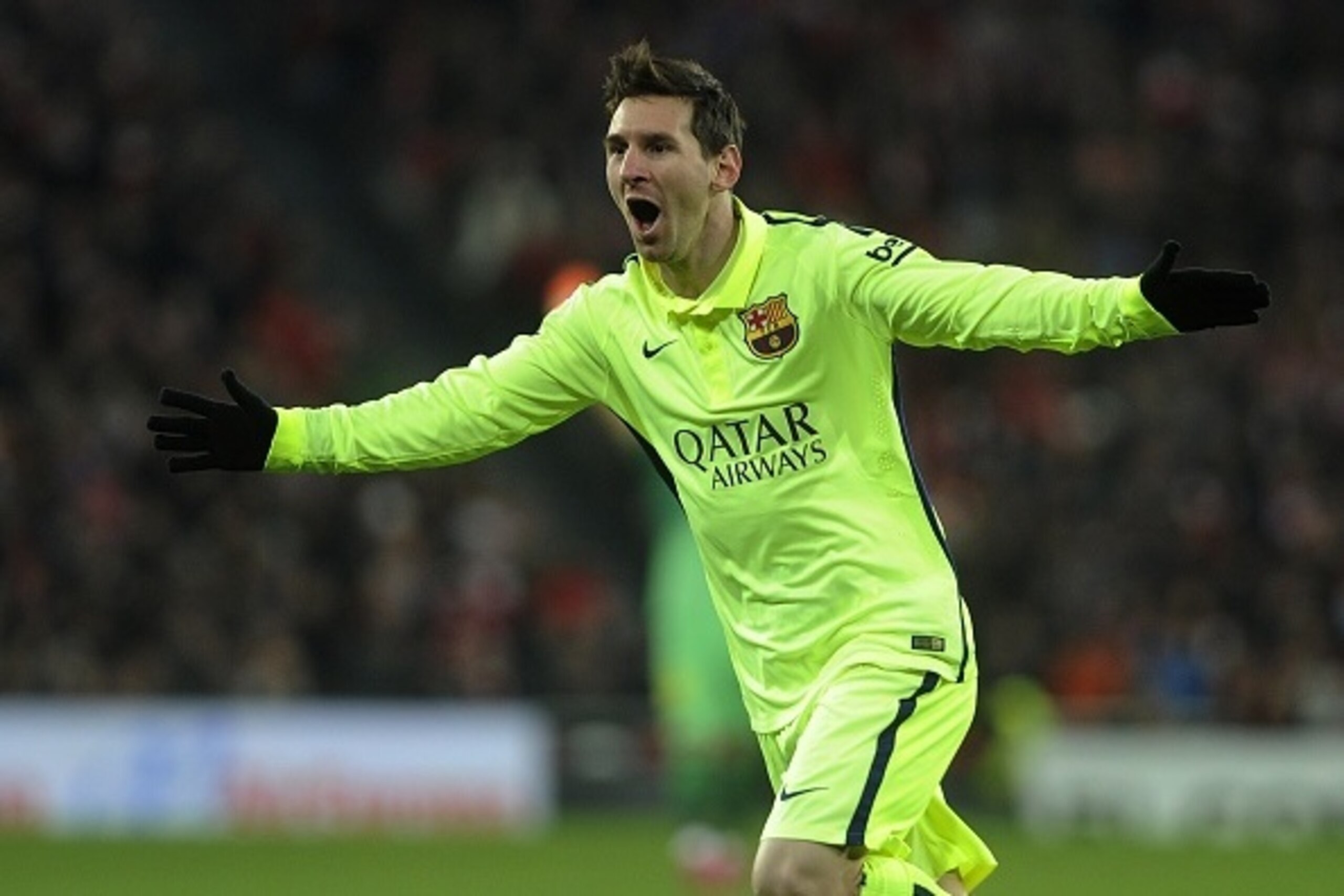 Barcelona's Argentinian forward Lionel Messi celebrates after scoring during the Spanish league football match Athletic Club Bilbao vs FC Barcelona at the San Mames stadium in Bilbao on February 8, 2015.   AFP PHOTO/ ANDER GILLENEA        (Photo credit sh