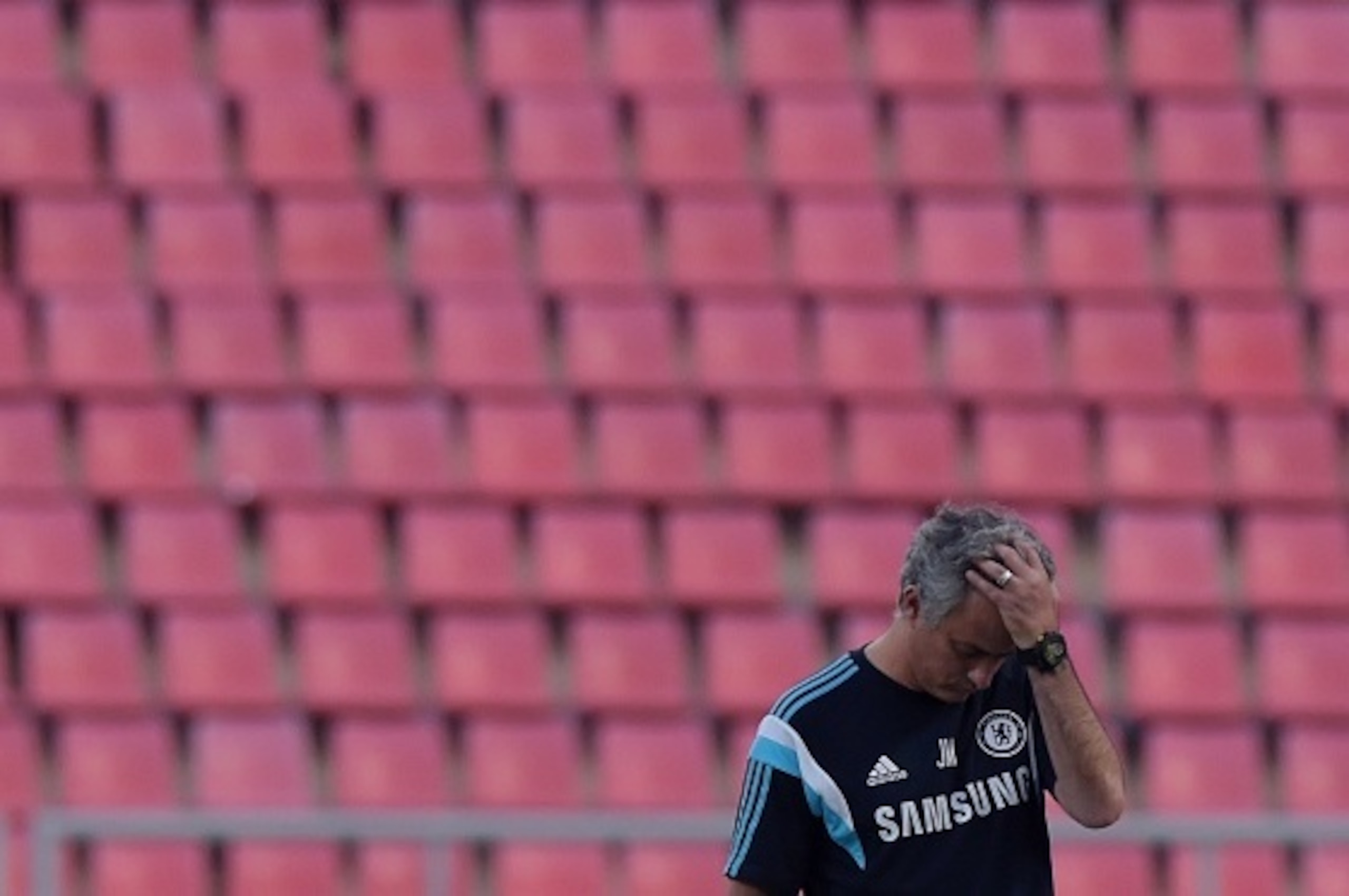 Chelsea manager Jose Mourinho reacts during a team football training session at Rajamangala Stadium in Bangkok on May 29, 2015. The Blues will meet Thailand's All Stars at the 49,000-capacity Rajamangala Stadium in Bangkok for a special match on May 30.  