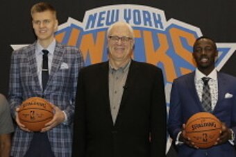 TARRYTOWN, NY - JUNE 26: L-R, General Manager Steve Mills,Kristaps Porzingis, first round Draft pick of the New York Knicks, President Phil Jackson, Jerian Grant, first round Draft pick and Head Coach Derek Fisher pose for a photo during a press conferenc